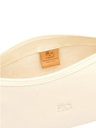 Cream leather bag interior with a white zipper. Features a brown Il Bisonte brand tag and a subtle embossed bison logo.
