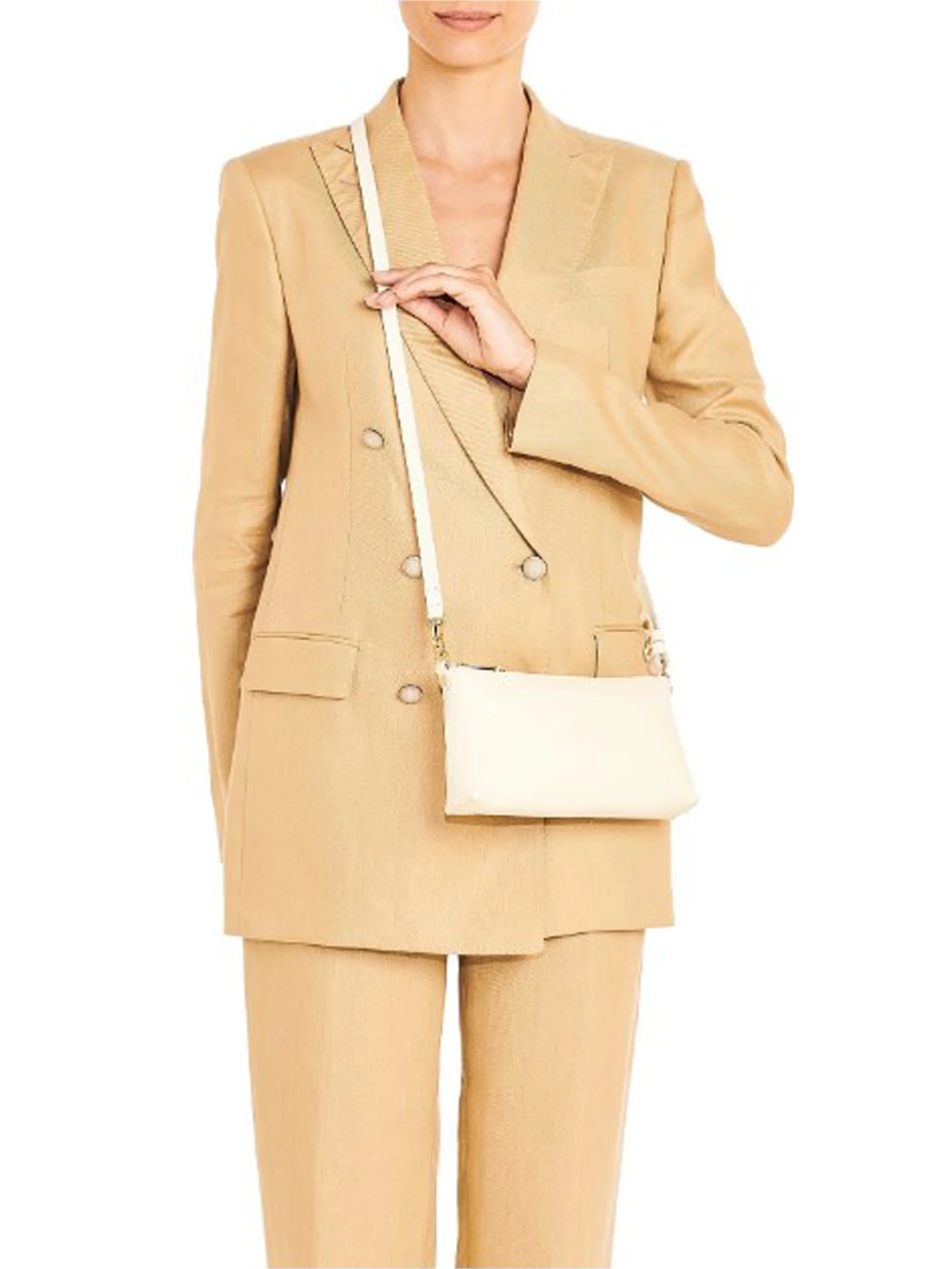 Cream, small, soft rectangular shoulder bag with a thin strap, worn crossbody by a model.