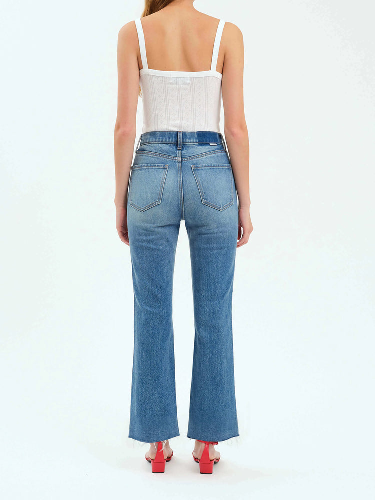 Here's alt text for the image, keeping it concise and focusing on visual details:
"Back view of light-wash, straight-leg...