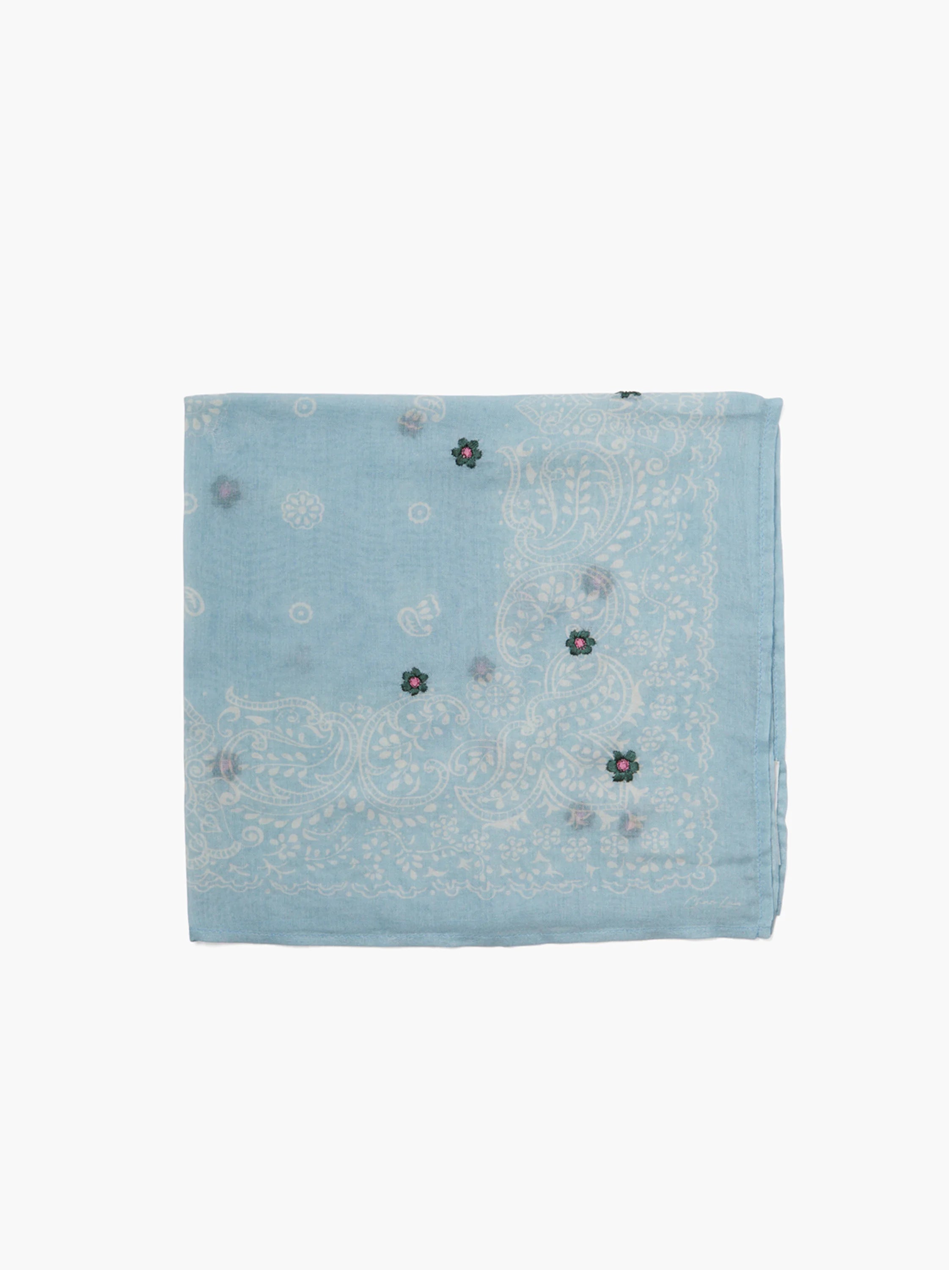 Light blue bandana with white paisley pattern and small embroidered flowers in pink and green.