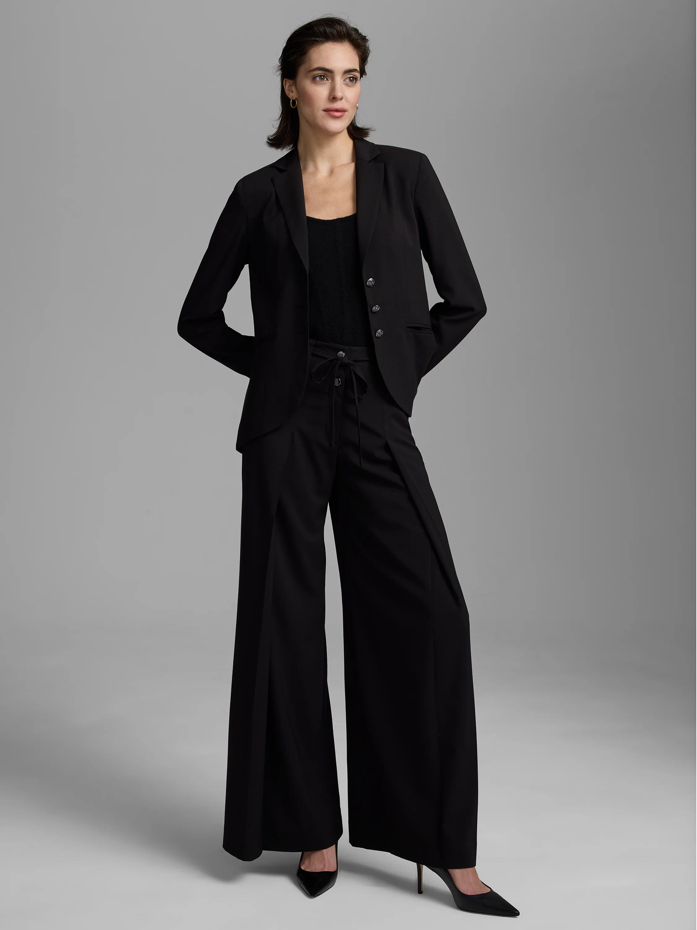 Black Juliette blazer with notched lapel, 3 buttons, and matching wide-leg pants.