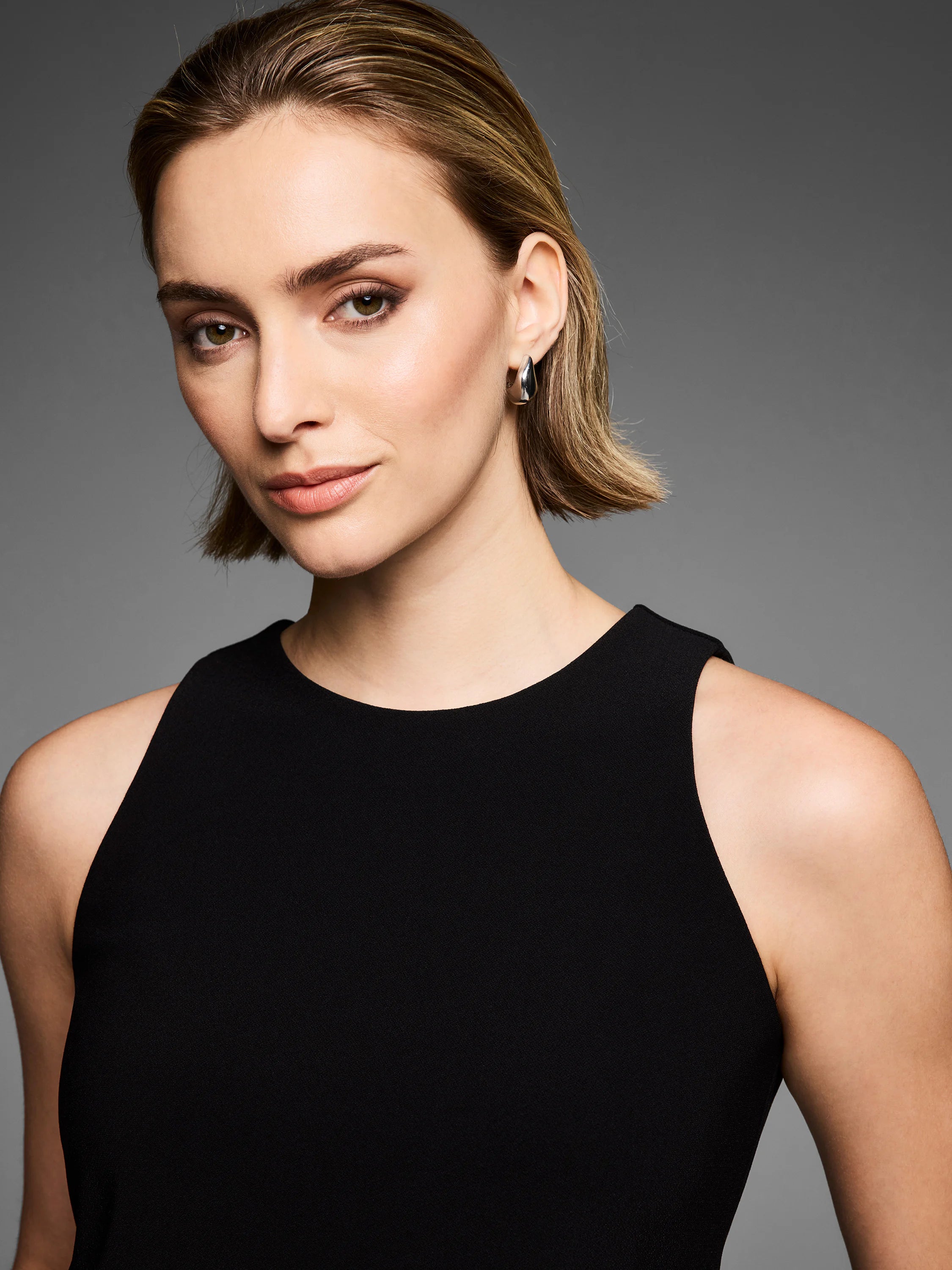 Black knit scuba high neck tank top.