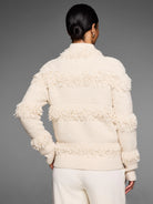 Off-white textured jacket (back view) with placed fringe bands on the body and sleeves.