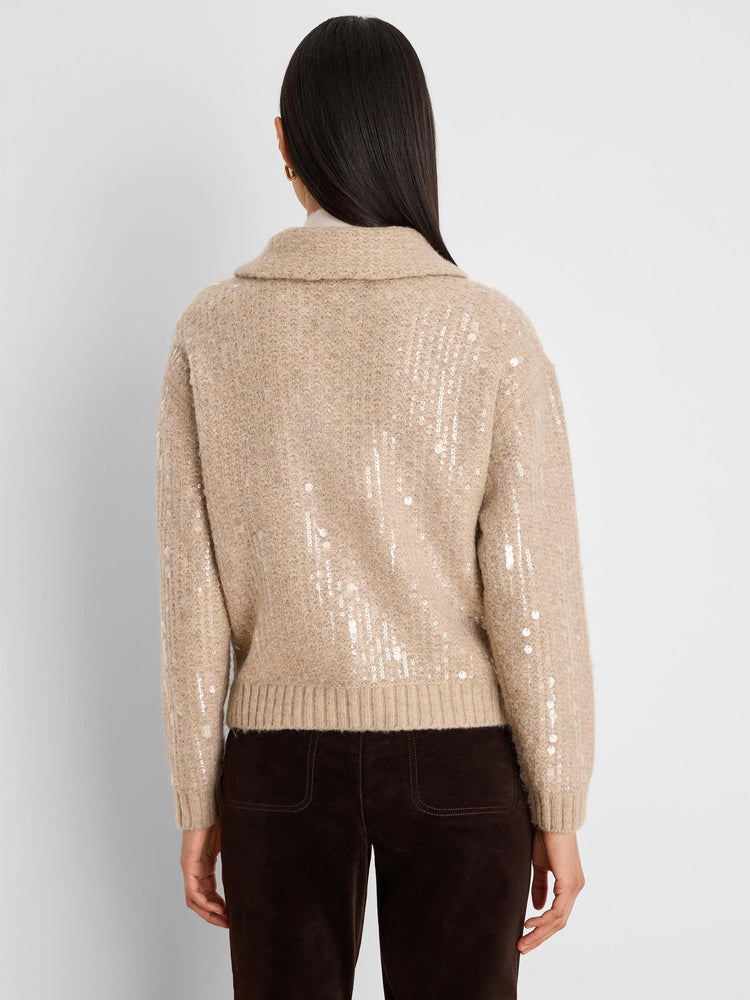 Beige textured knit jacket with clear shimmering sequins throughout. Back view.