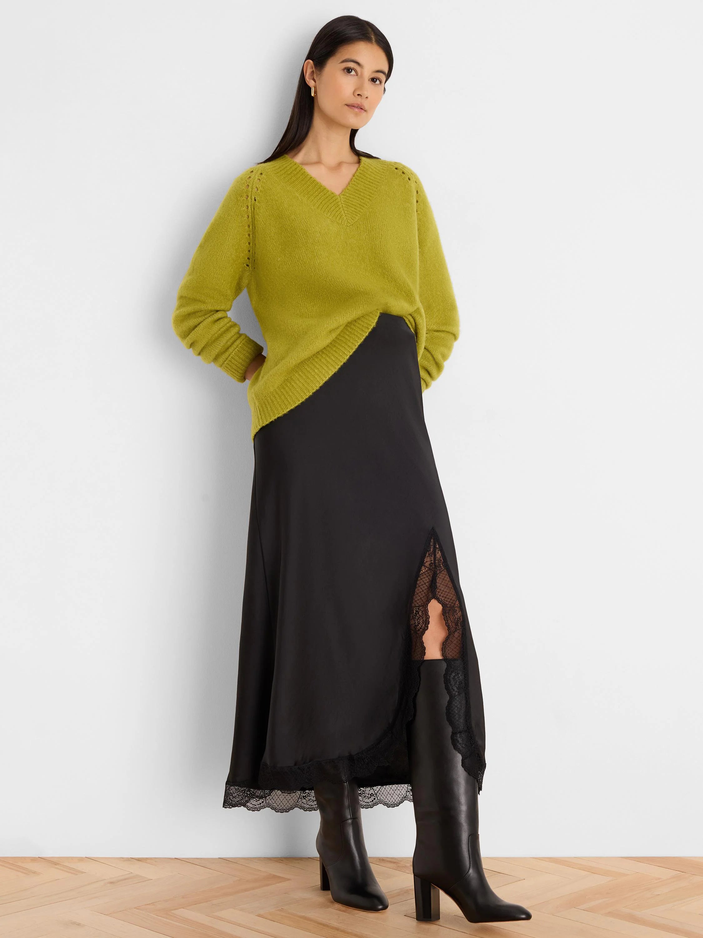 Chartreuse V-neck sweater, fuzzy knit, with openwork details on shoulders.