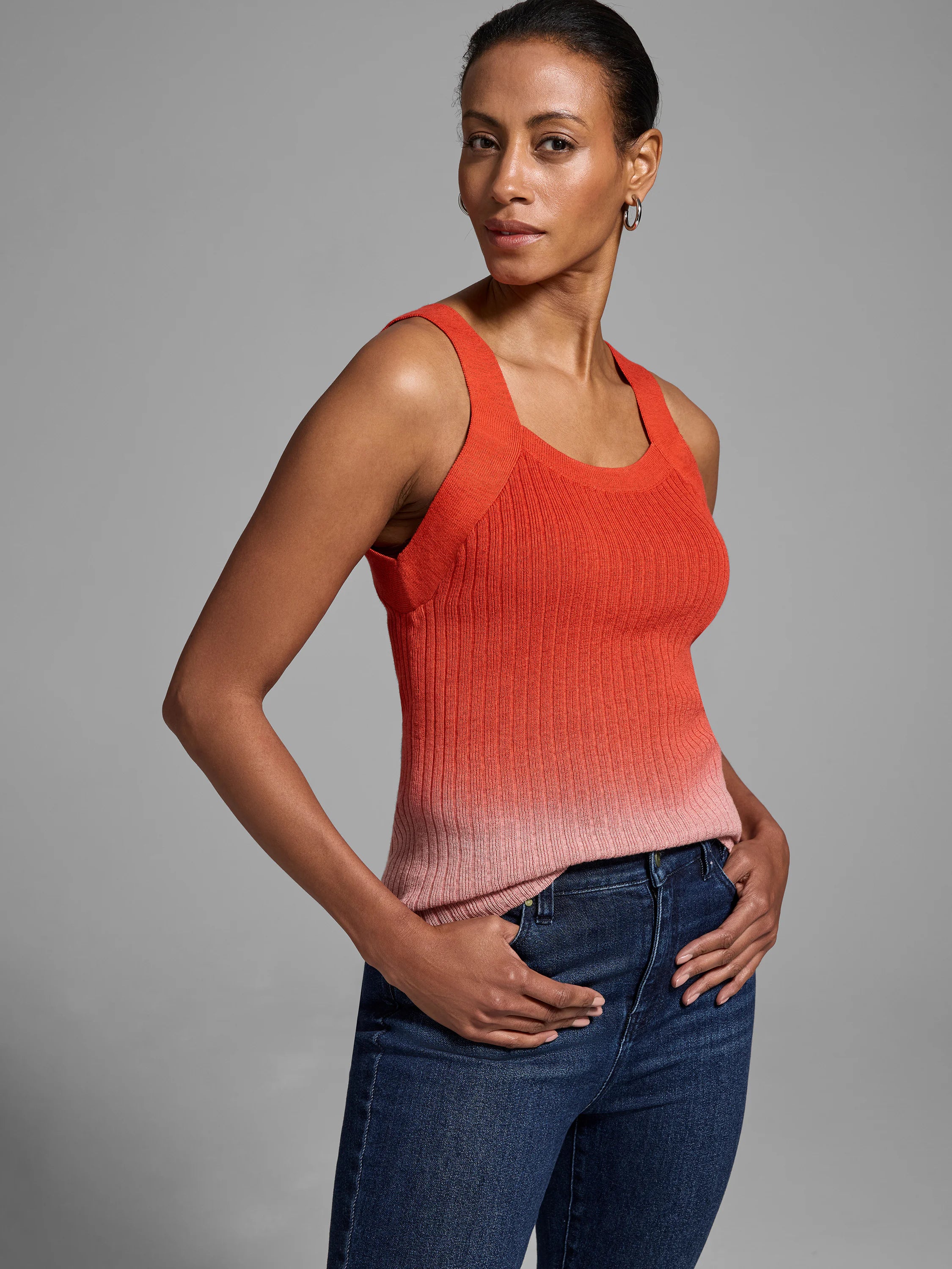 Ribbed tank top; ombre design fading from coral to light pink.  Sleeveless, square neck.
