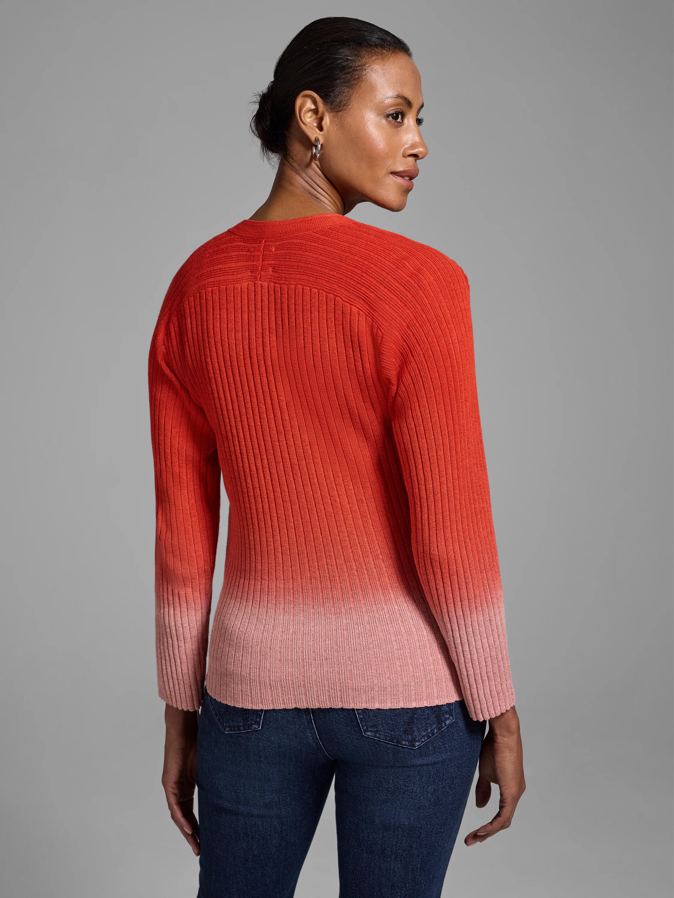 Red ribbed knit cardigan, ombre fading to pink at hem and sleeves.  Long sleeves.