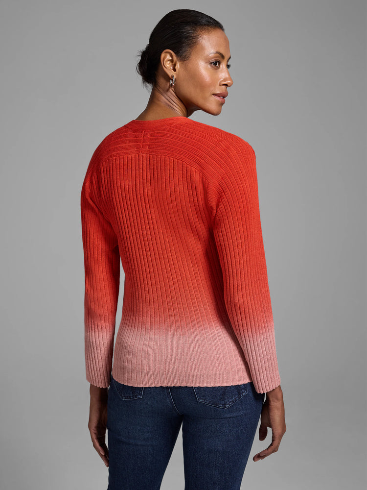 Red ribbed knit cardigan, ombre fading to pink at hem and sleeves. Long sleeves.