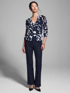 Navy blue and white abstract print rib knit tank top; long sleeves, button front.