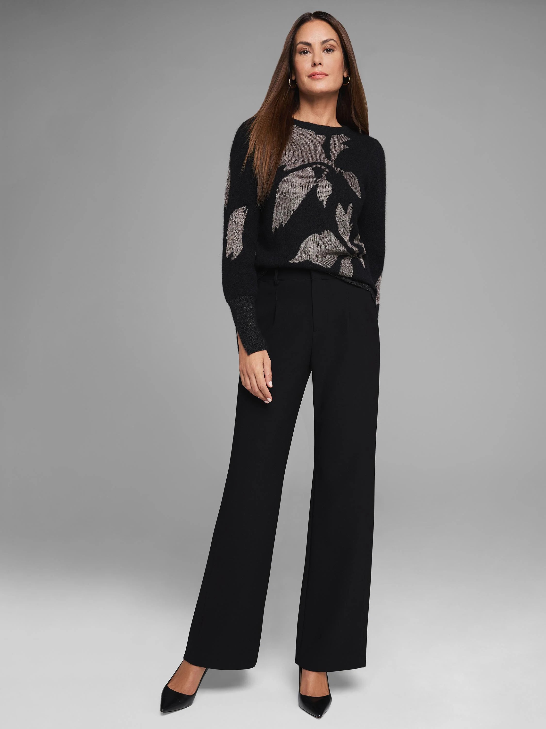 Black knit sweater with metallic gold floral pattern.  Long sleeves, crew neck.