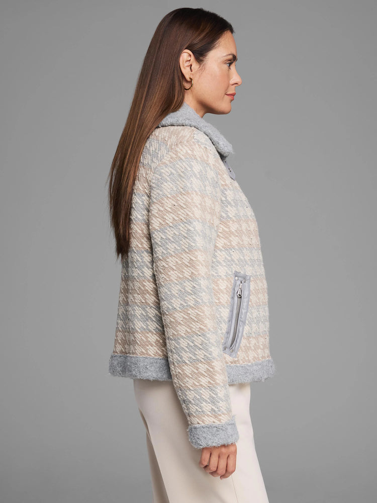 Cream & light grey houndstooth knit jacket with a fuzzy texture. Grey ribbed collar, cuffs, hem, & zippered pockets.