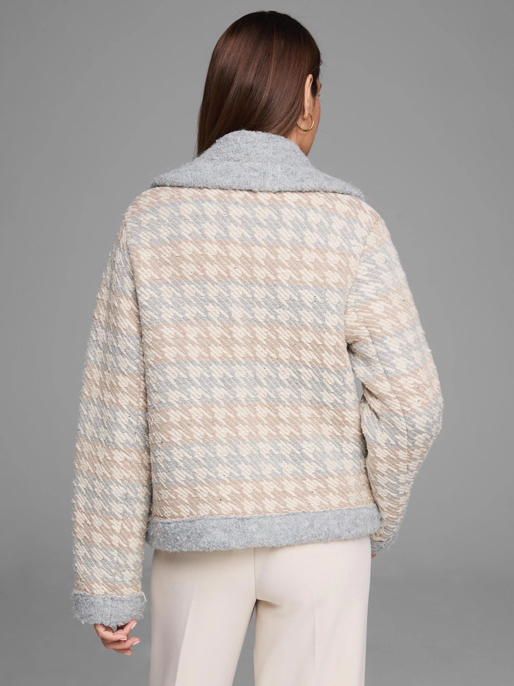 Beige and light grey houndstooth knit jacket, back view. Features a contrasting light grey collar, cuffs, and hem.