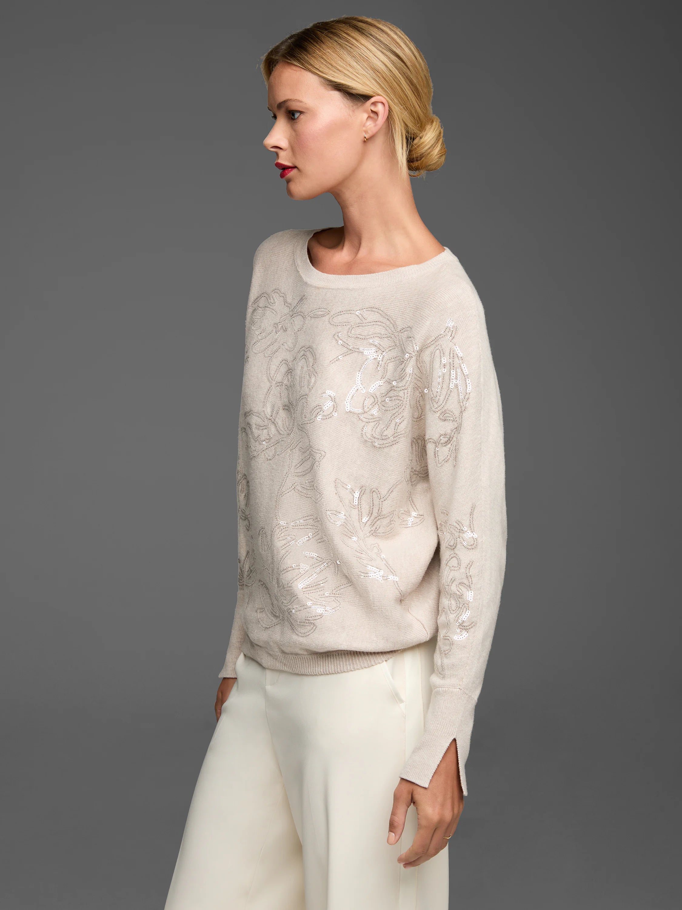 Pale cream sweater with silver thread floral embroidery & white sequins.