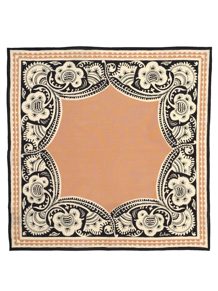 Square bandana: peach center, framed by intricate black, cream, and peach floral-scrollwork borders.