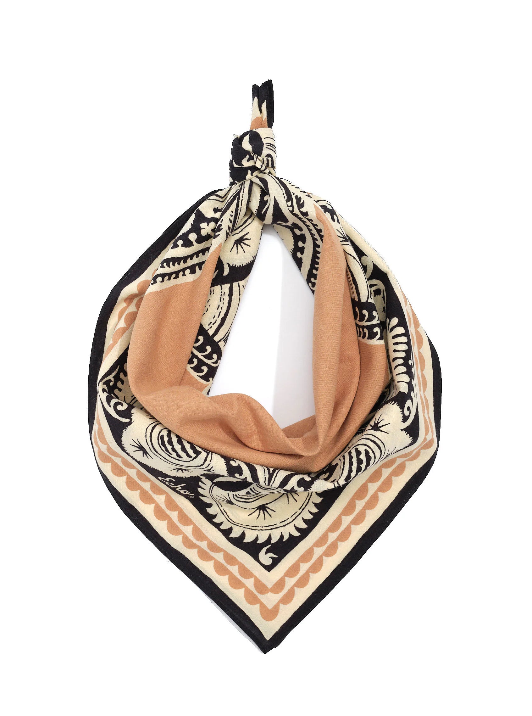 Folded bandana tied at top. Cream, black, and tan bohemian print with intricate designs and scalloped borders.