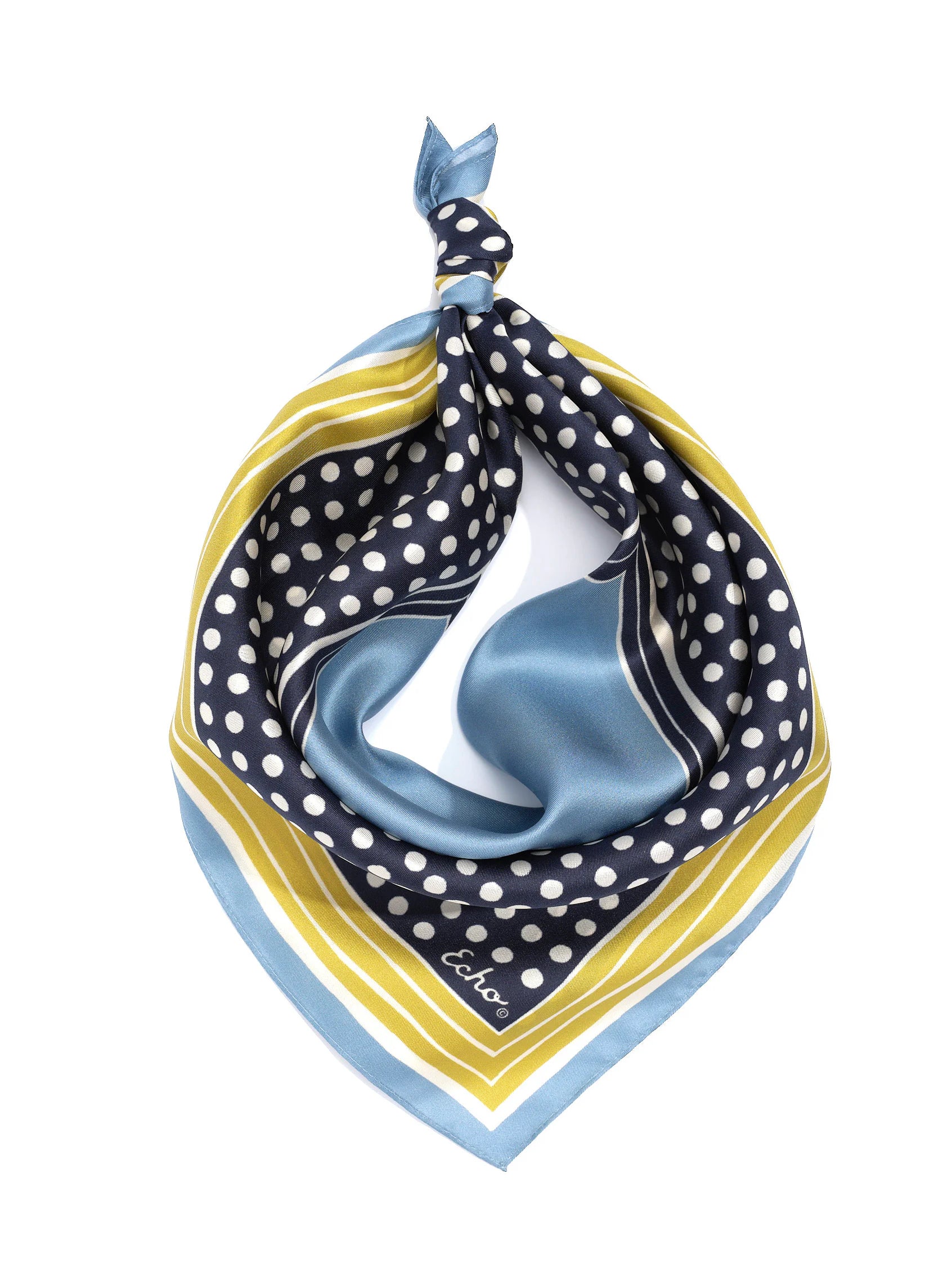 Navy polka dot silk bandana with yellow, light blue, and white stripes. Knotted.