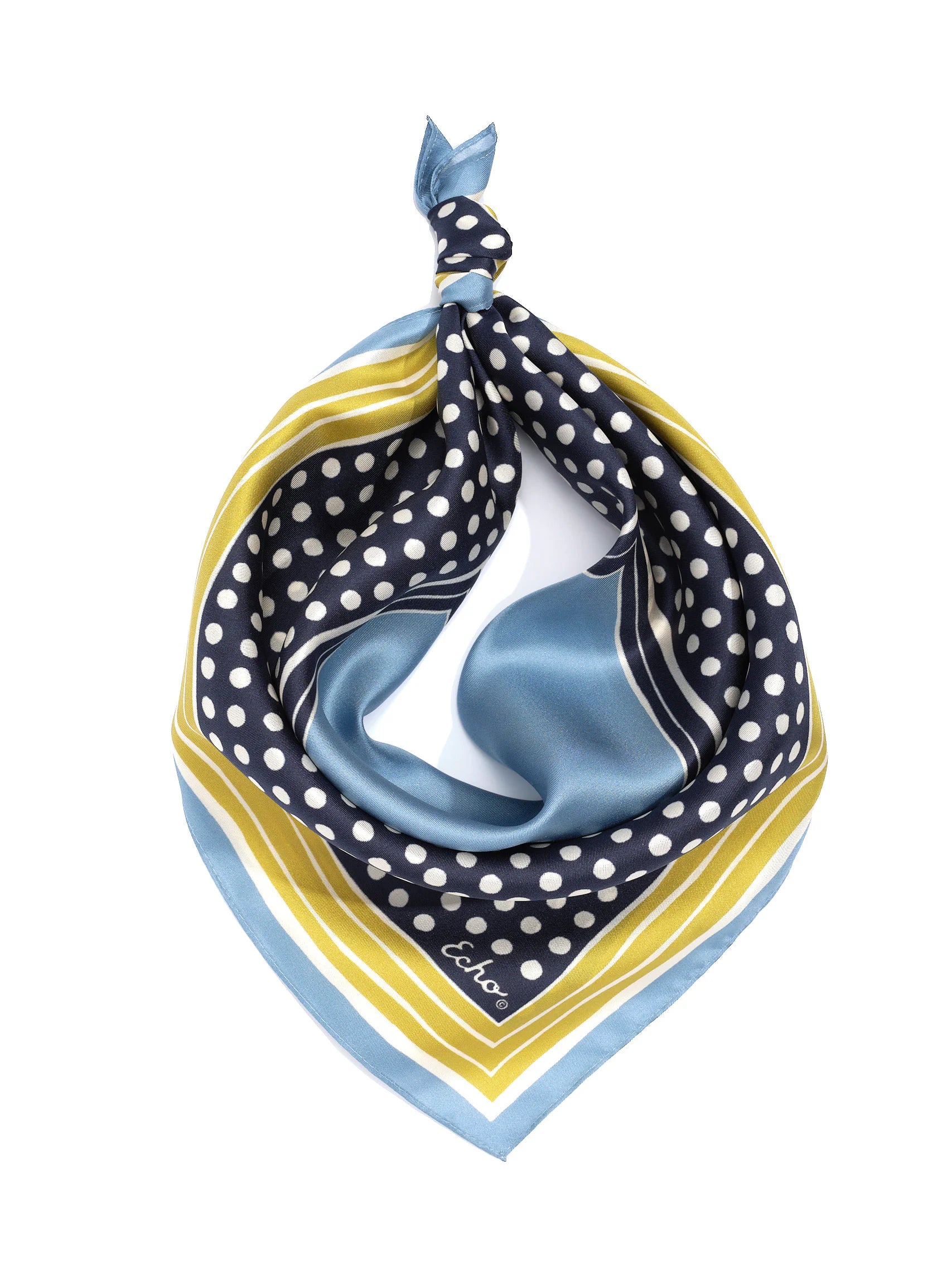 Navy polka dot silk bandana with yellow, light blue, and white stripes. Knotted.