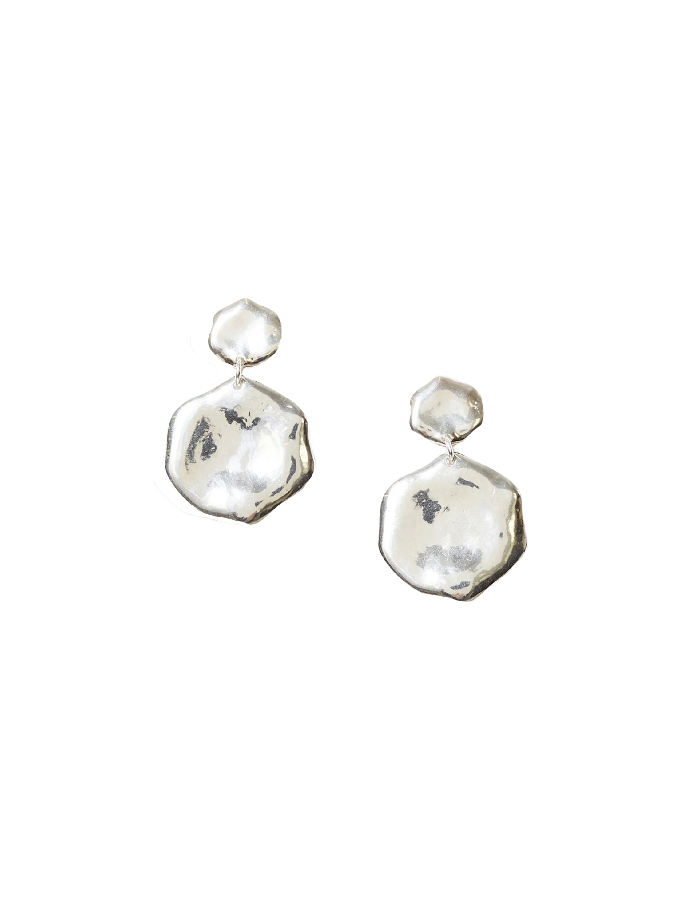 Pair of silver hammered drop earrings, each with two irregular, organic-shaped metal pieces.