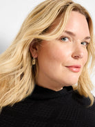 Gold-toned textured dangle earrings, shaped like tiny padlocks with a central keyhole design.