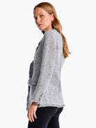 Gray knit blazer with black flecks, fringed edges.  Three-quarter sleeves.