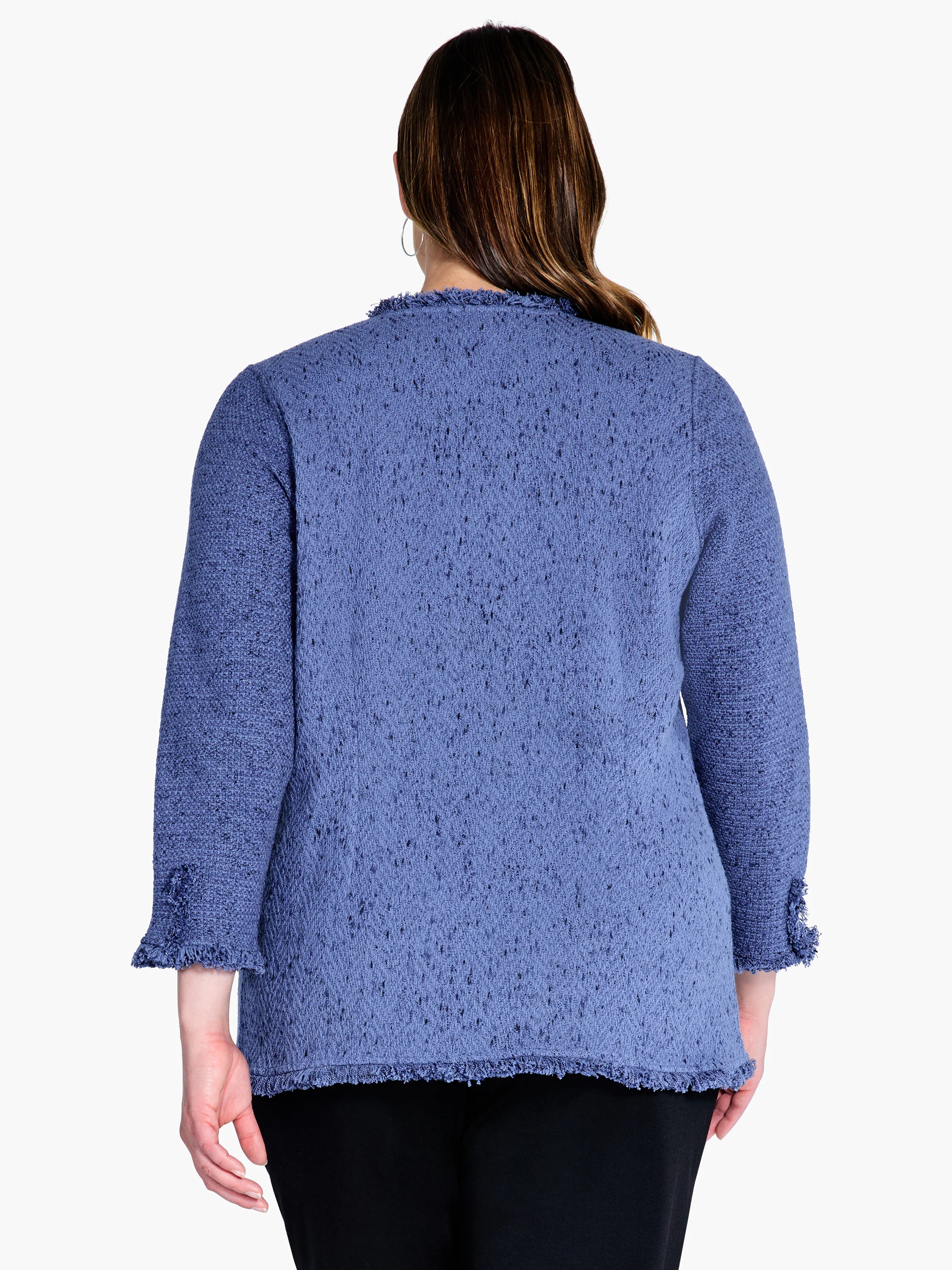 Dusty blue knit blazer, three-quarter sleeves, fringed edges.  Textured fabric with visible knit pattern. Rear view.