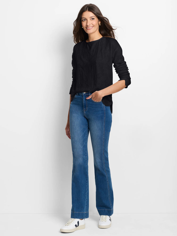 Black lace knit long-sleeve tee with a round neck and relaxed fit, shown on a model.