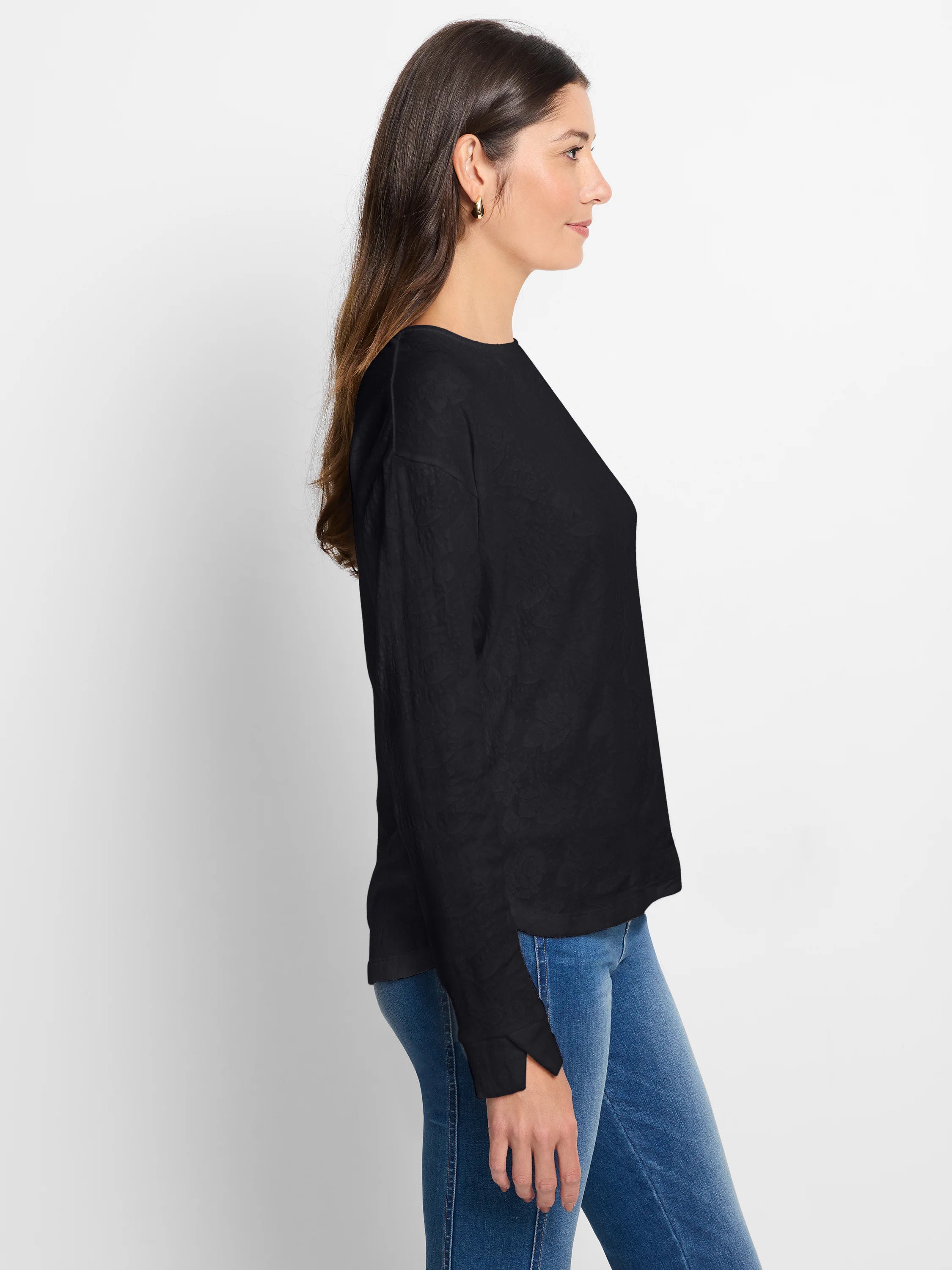 Black long-sleeve tee with round neck, subtle lace knit pattern, and cuff slit.
