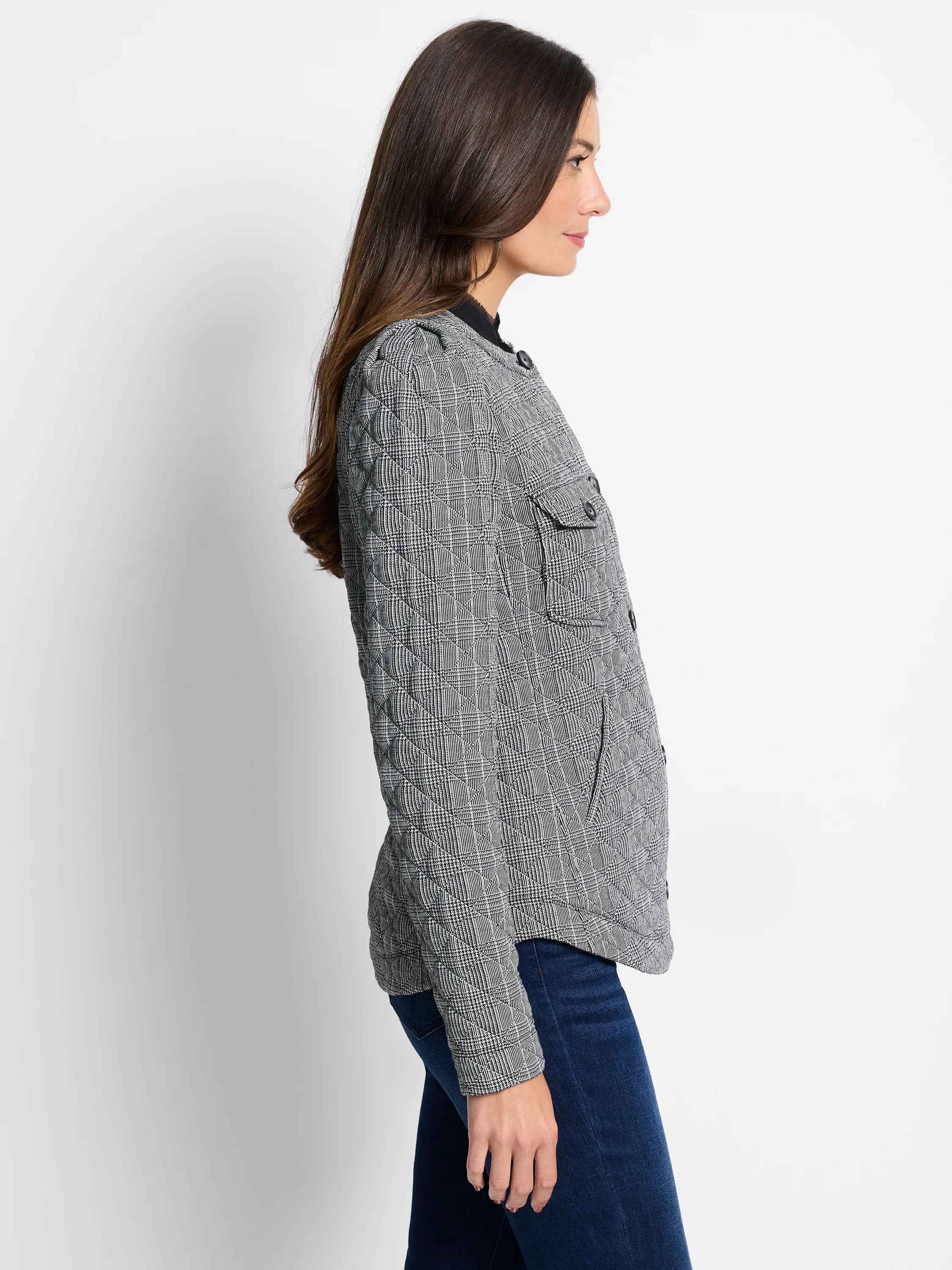 Black and white quilted plaid jacket with diamond stitching, button front, and two chest flap pockets.