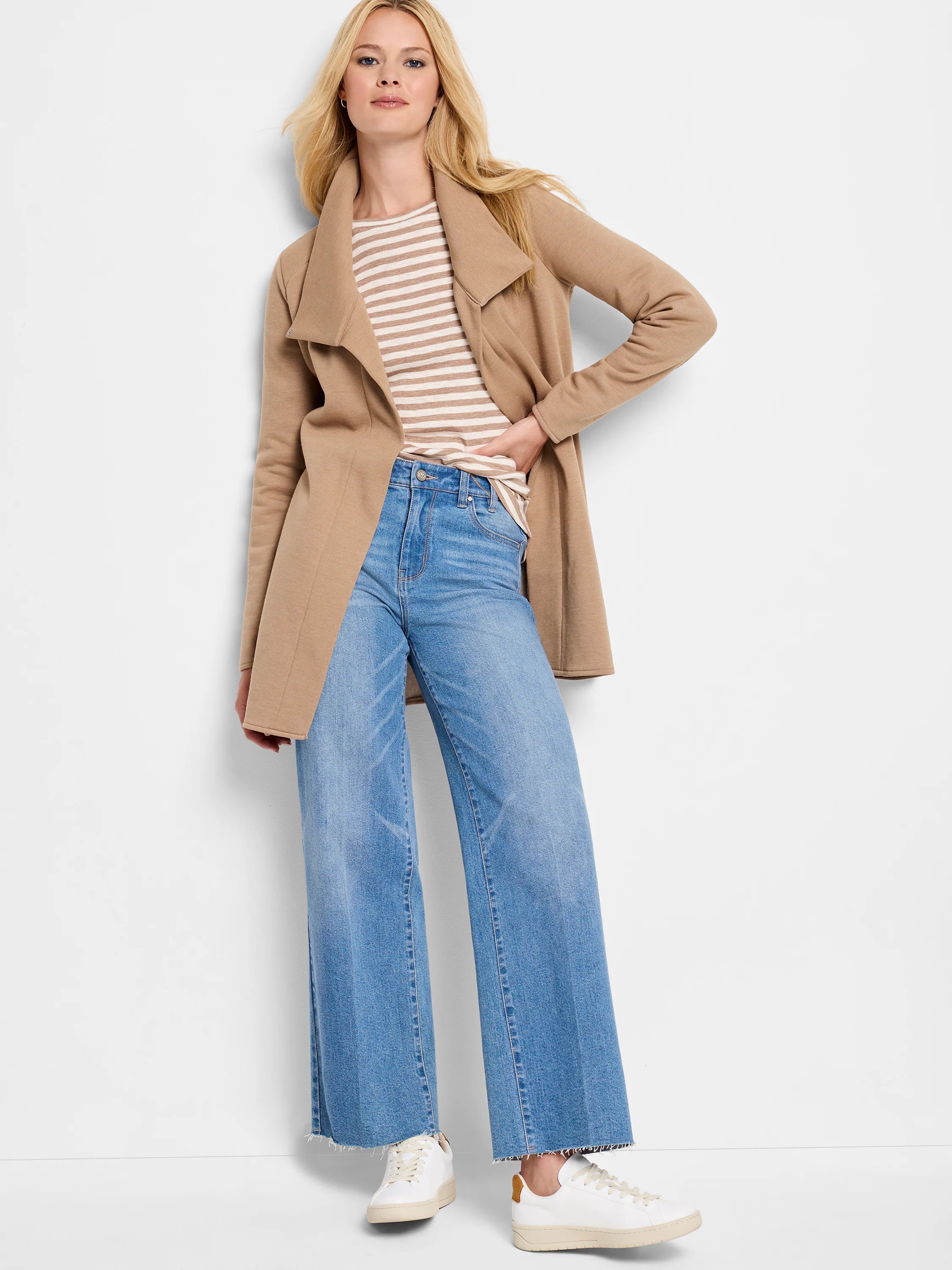 Tan, hip-length jacket with an open front and wide, draped collar. Appears soft.