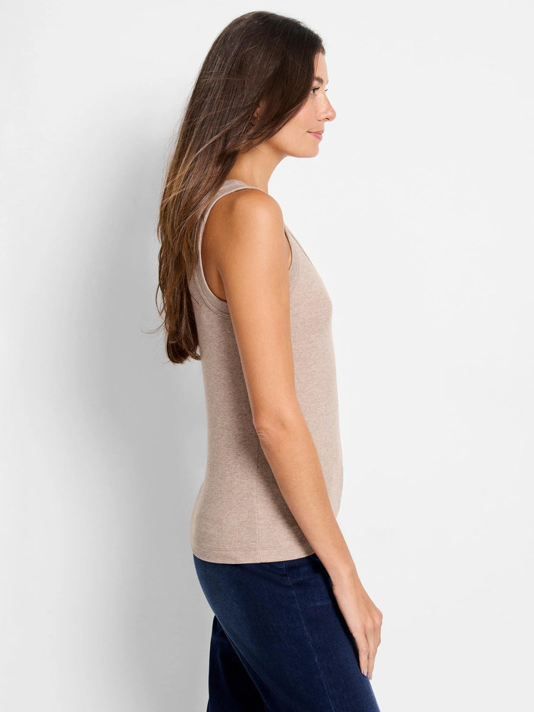 Beige ribbed knit scoop tank top worn by a woman, shown in profile.