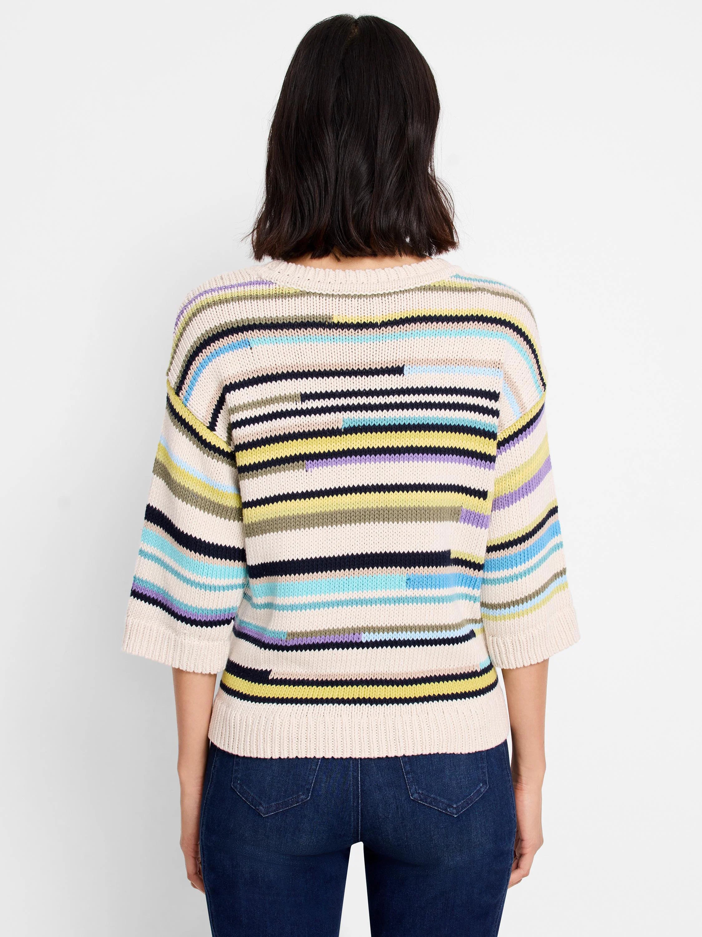 Off-white sweater with mixed horizontal stripes in navy, light blue, yellow, olive, and lavender, with 3/4 sleeves.