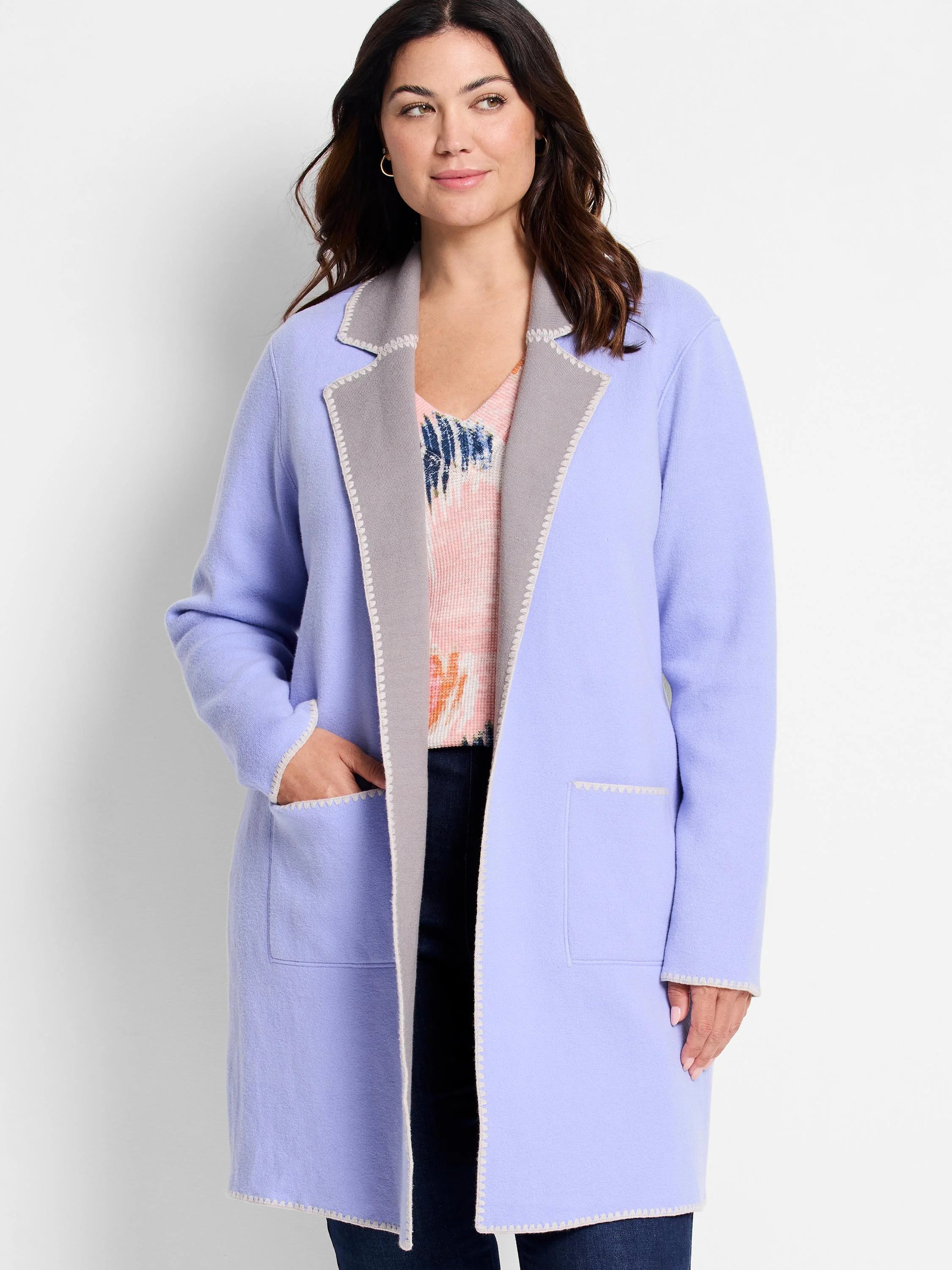 Lavender reversible knit jacket with gray interior and cream contrast stitching, open front, and patch pockets.