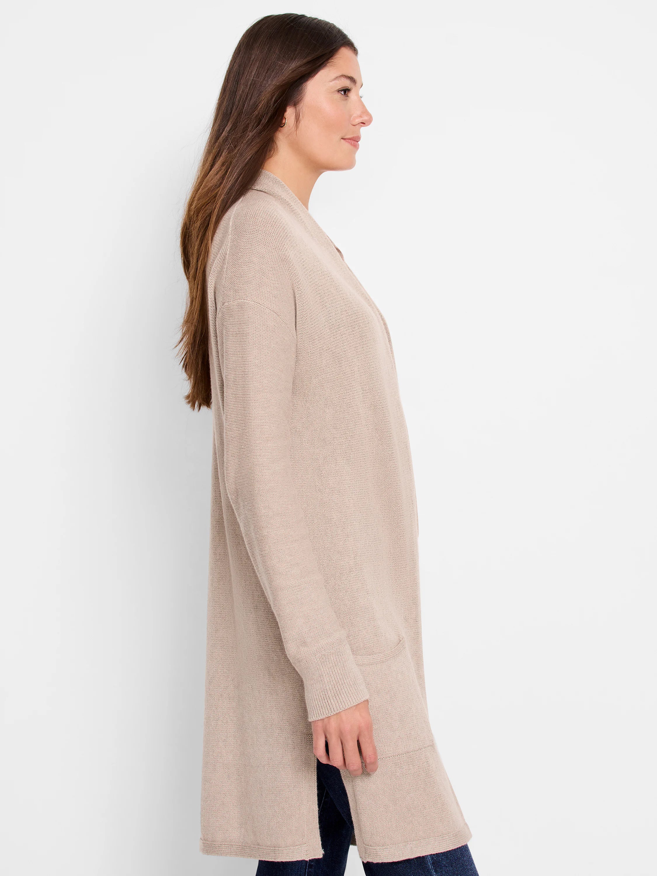 Light beige long open-front cardigan with ribbed cuffs, hem, and front edges. Features side pockets.