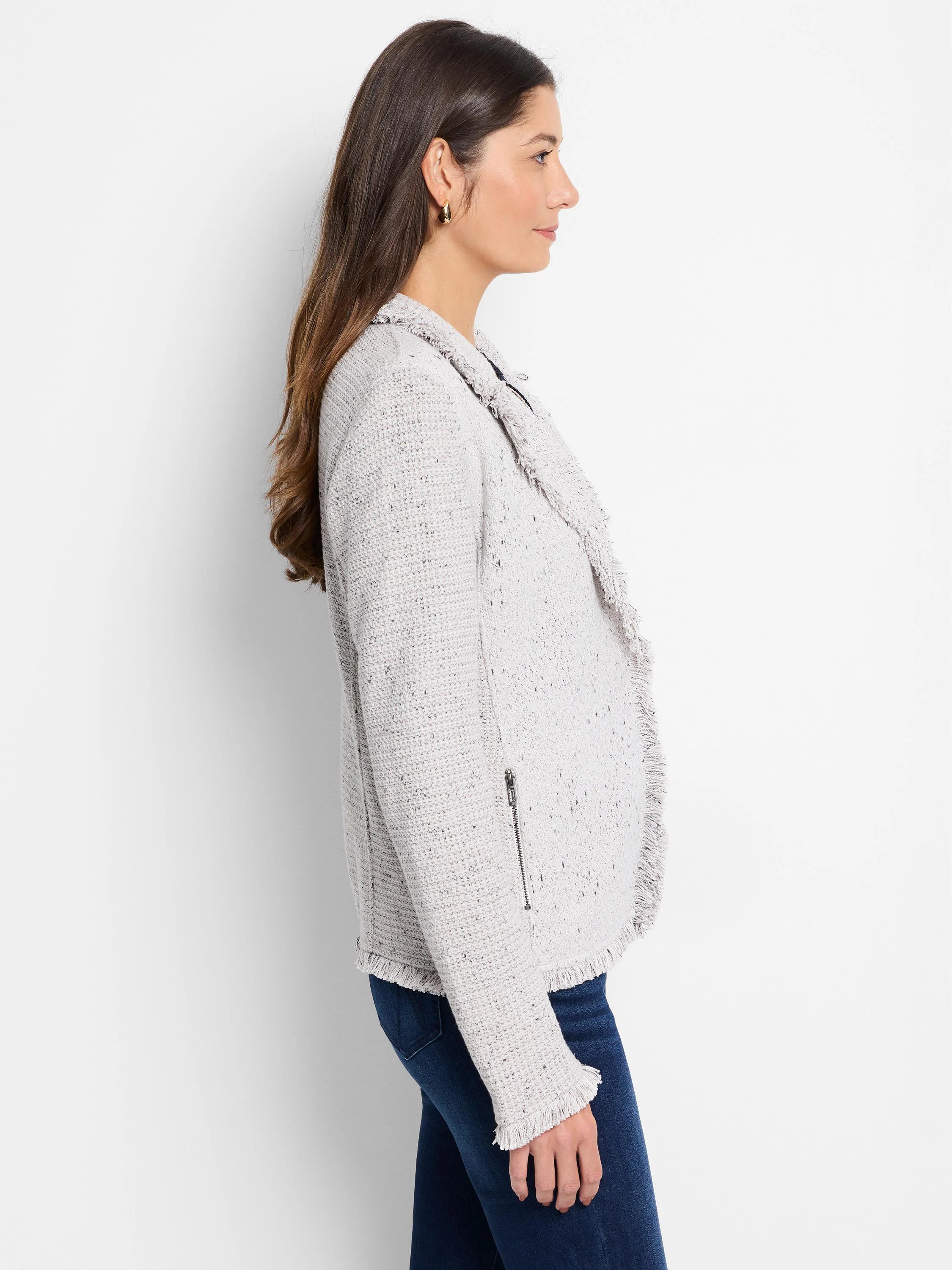 Flecked light gray knit jacket with fringe collar, front opening, and cuffs. Features a diagonal zipper.