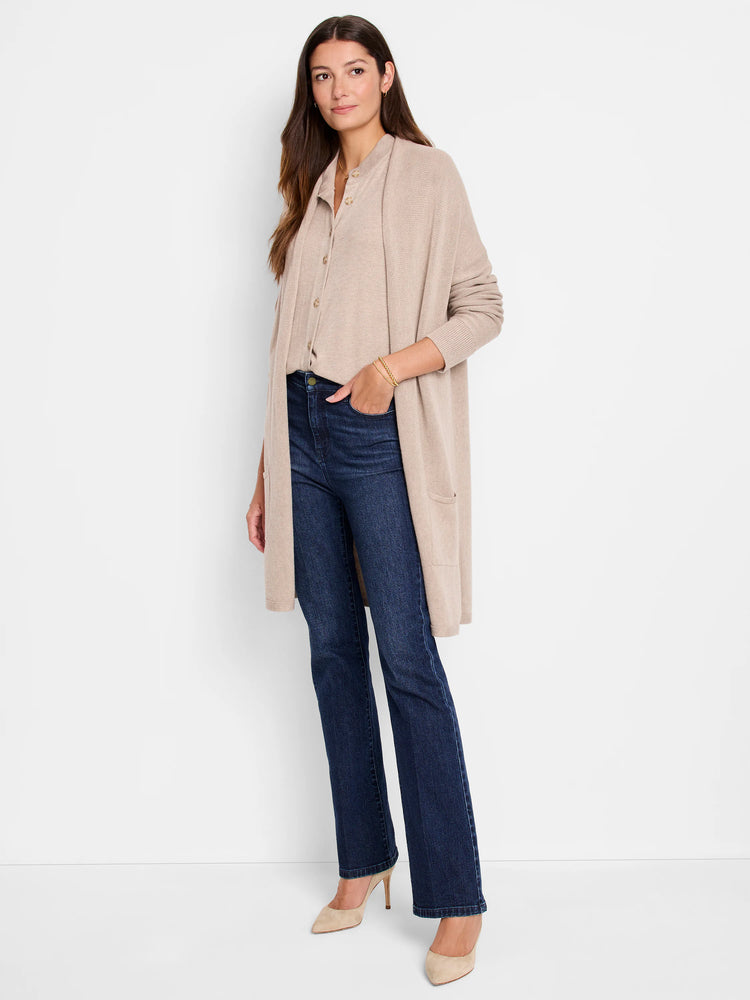 Long beige knit sweater vest with sleeves, open front, and two patch pockets.