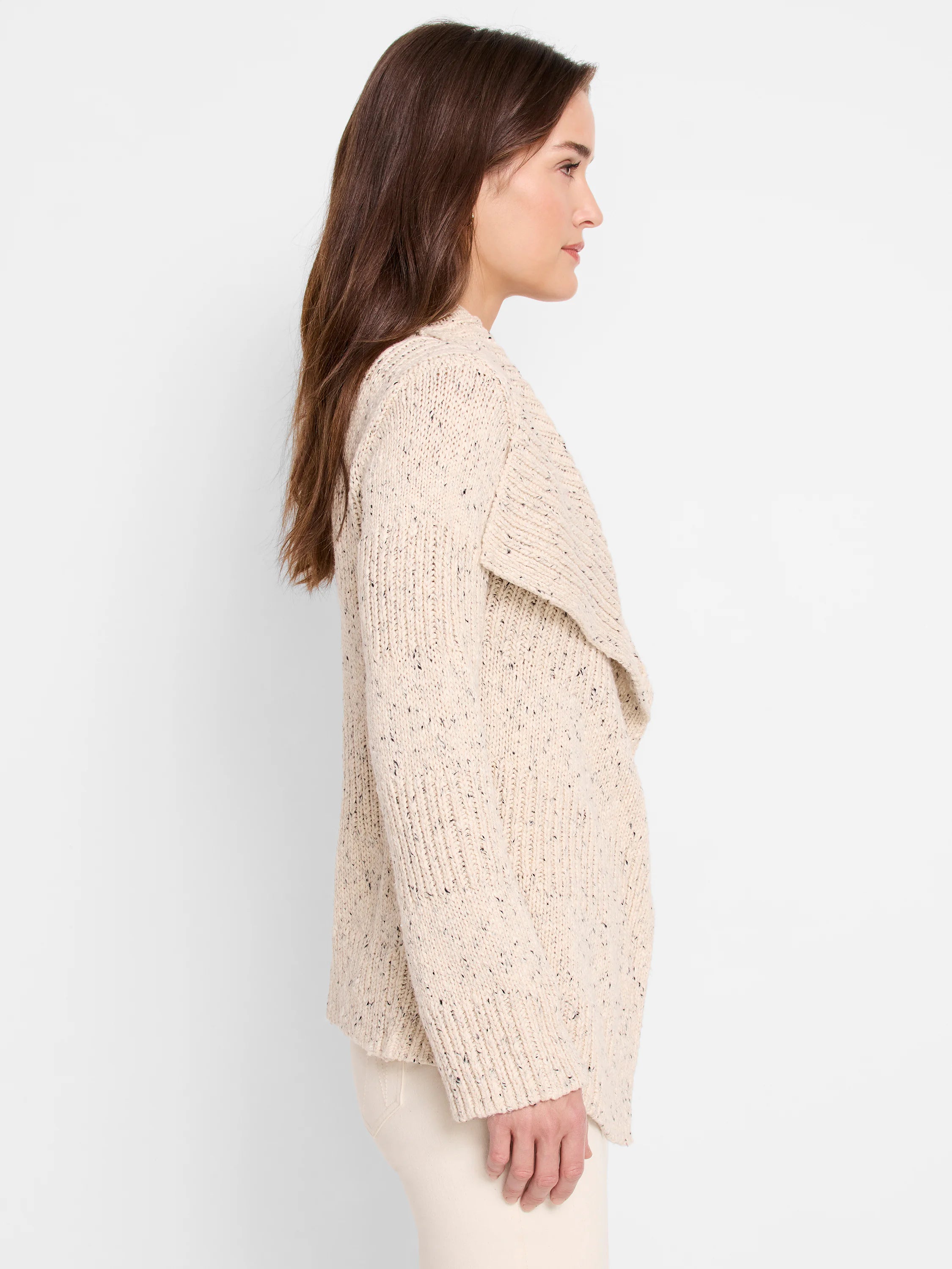 Cream tweed knit cardigan with dark speckles, featuring a draped open front and wide shawl collar.