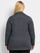 Dark grey knit blazer, back view, showing subtle texture, a collar, and horizontal back seams.
