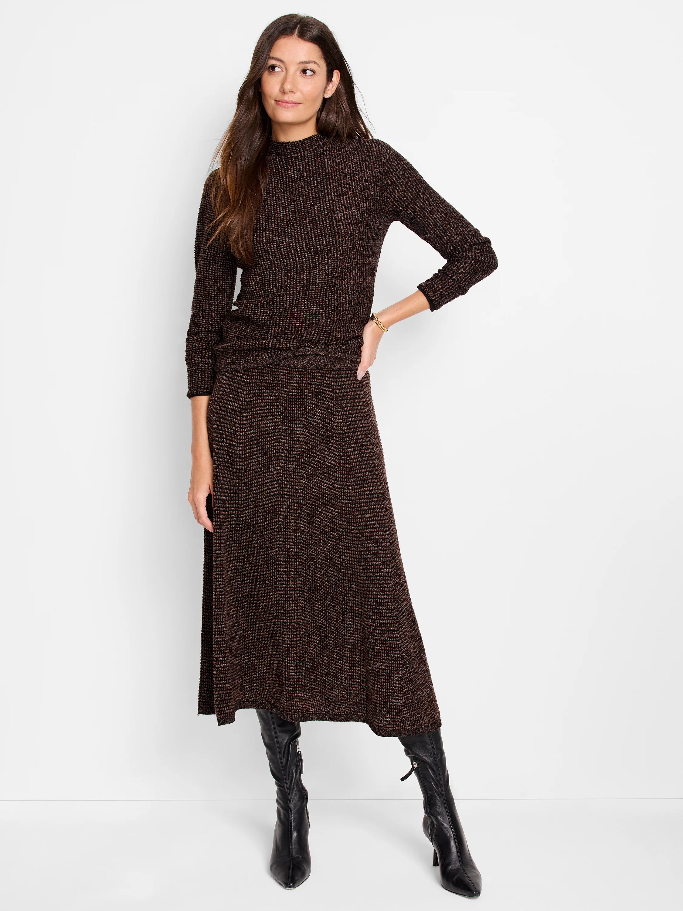 Brown and black textured knit sweater and midi skirt set. Long sleeves, mock neck.