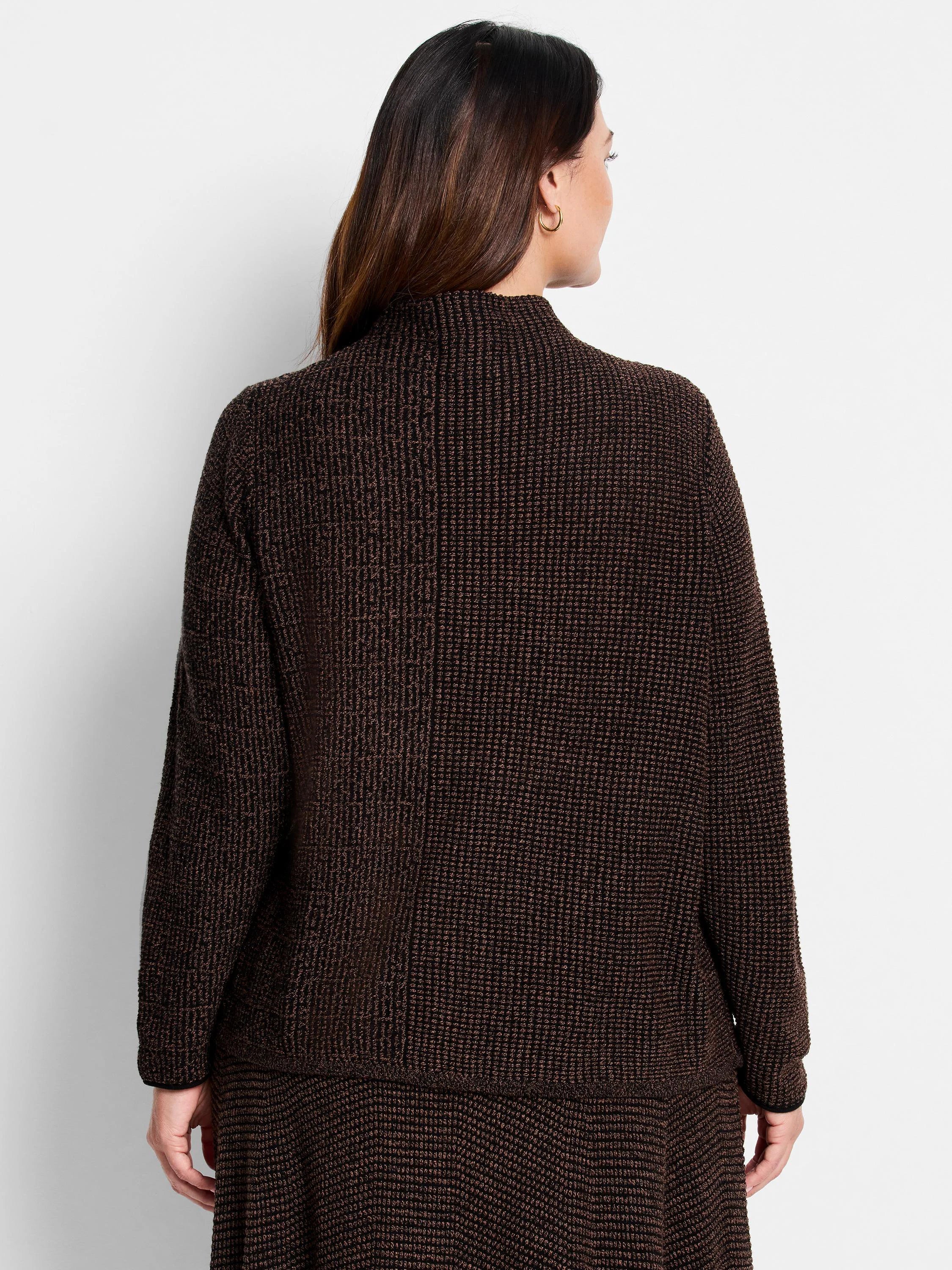 Dark brown pixel knit sweater with a high collar and long sleeves, shown from the back on a model.