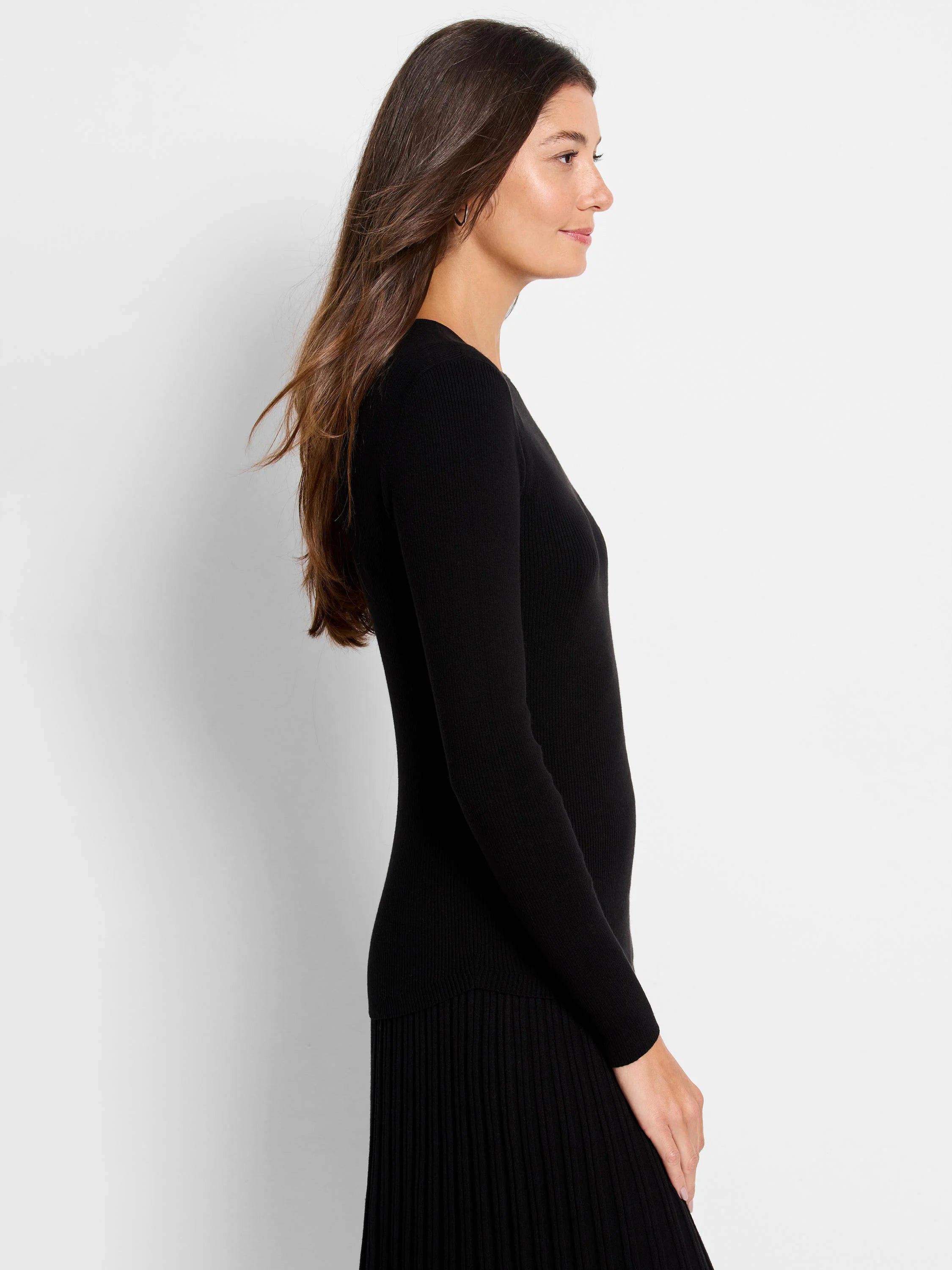 Black ribbed sweater tee with pleated hem; long sleeves.