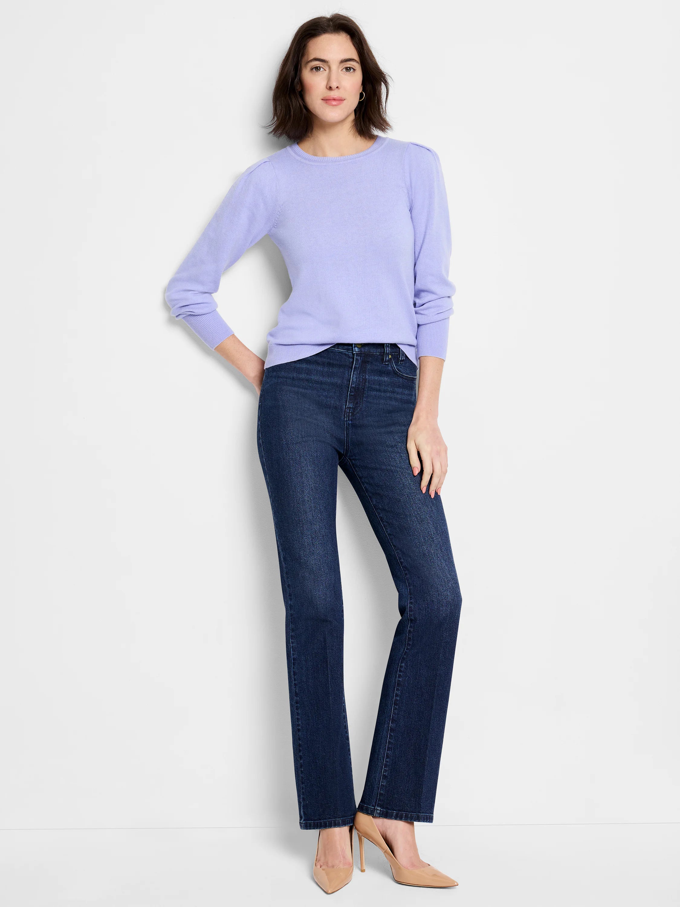 Lavender crew neck sweater with long, slightly puffed sleeves, and ribbed cuffs and hem.