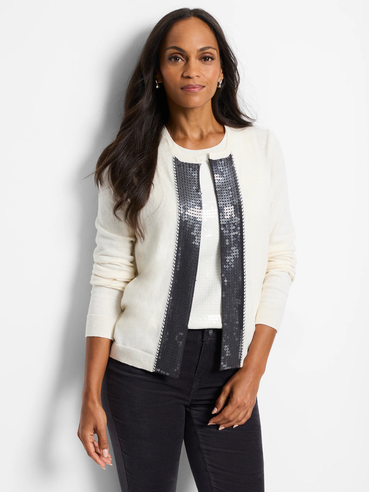 Cream open cardigan with dark sequin trim on front edges.