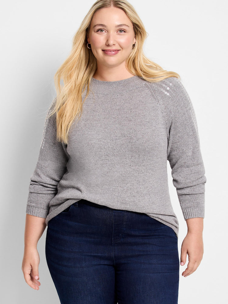 Gray crewneck sweater with subtle light-colored sequins on the shoulders. Long sleeves.