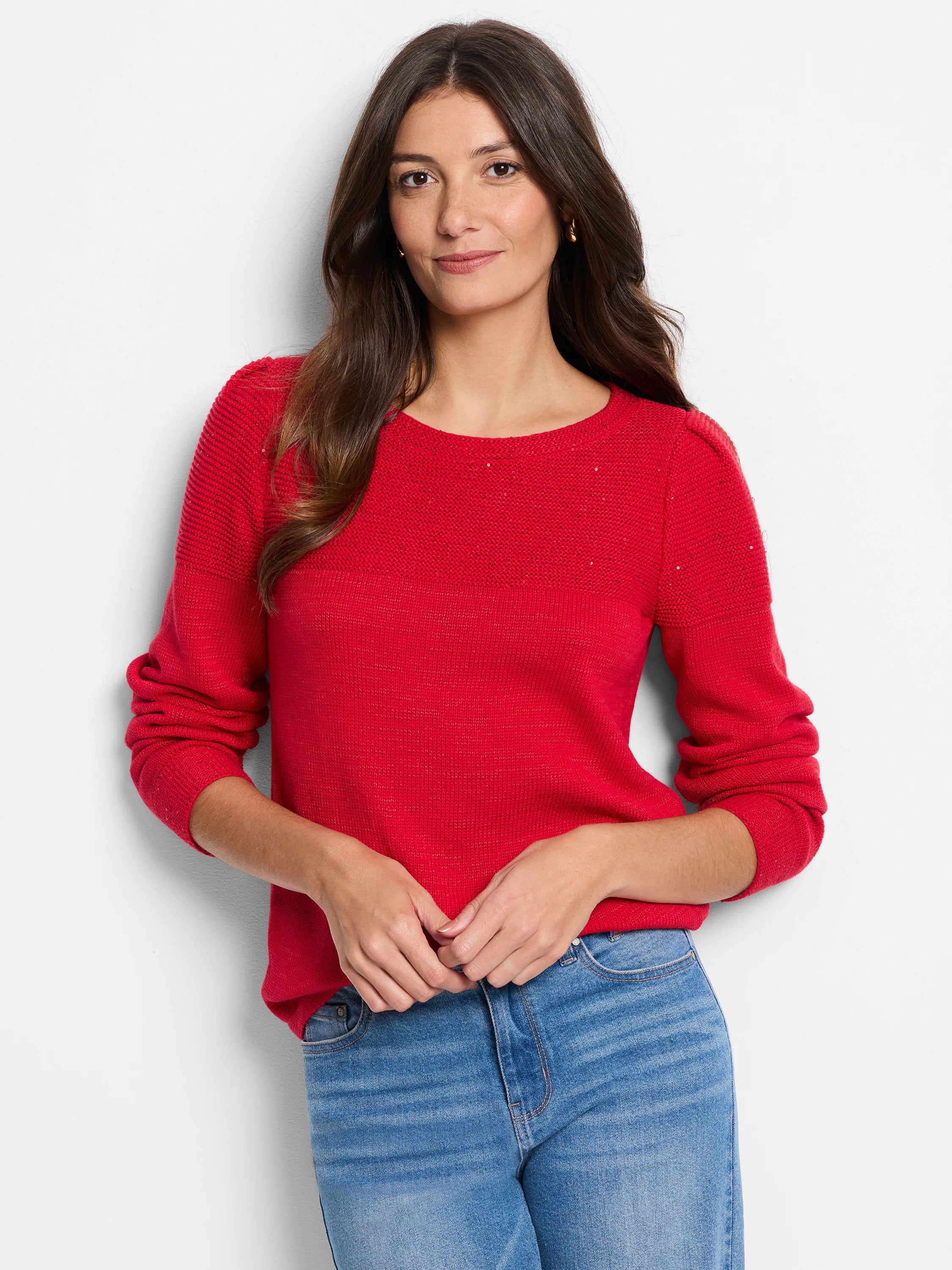 Red long-sleeve sweater with sequin detailing at neckline and shoulders. Slight puff sleeves.