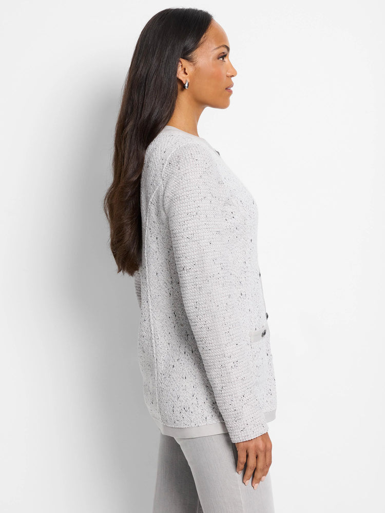 Gray speckled knit jacket with dark buttons. Long sleeves, buttoned front.