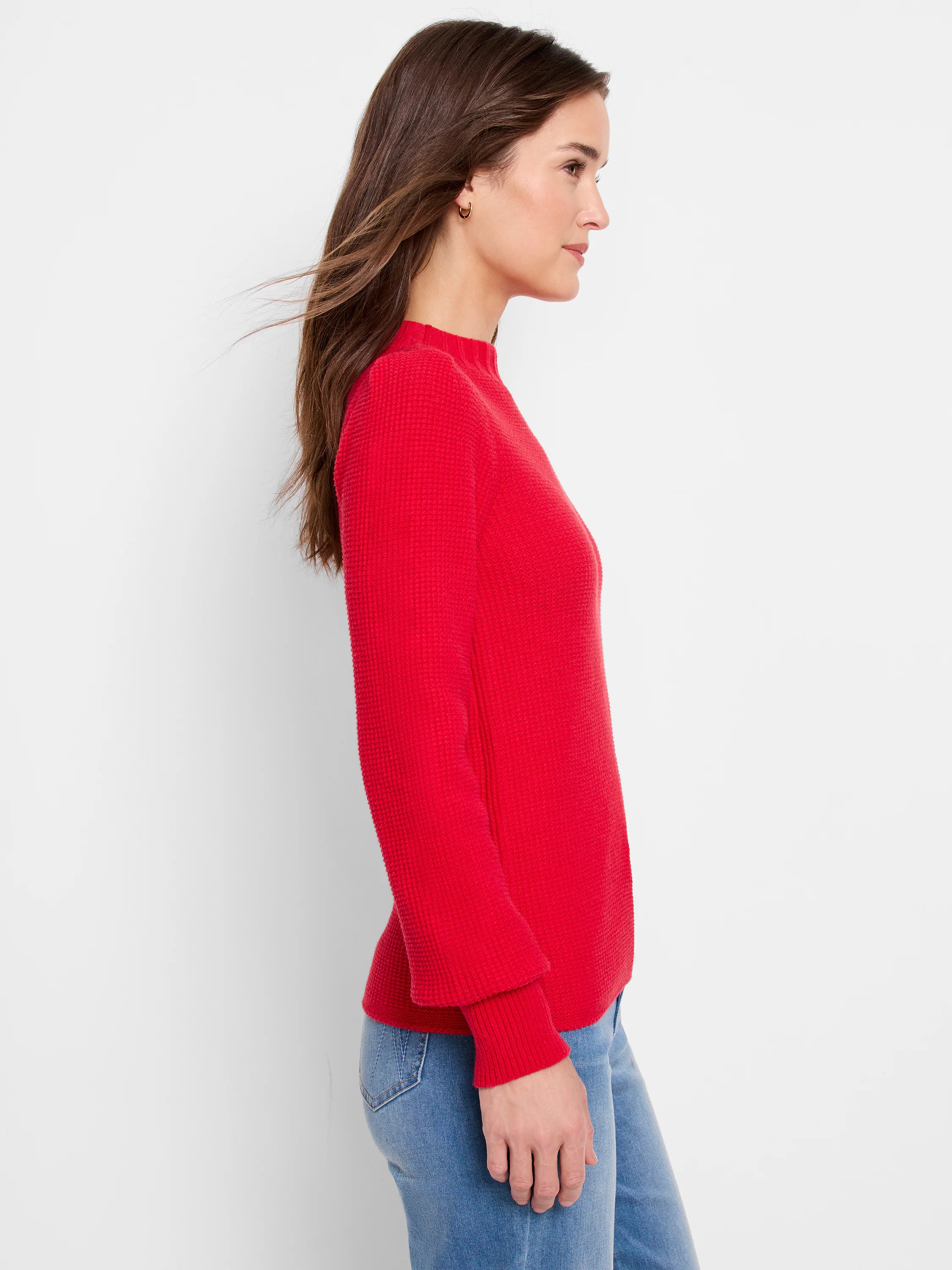 Red waffle-knit sweater, long sleeves, mock neck.