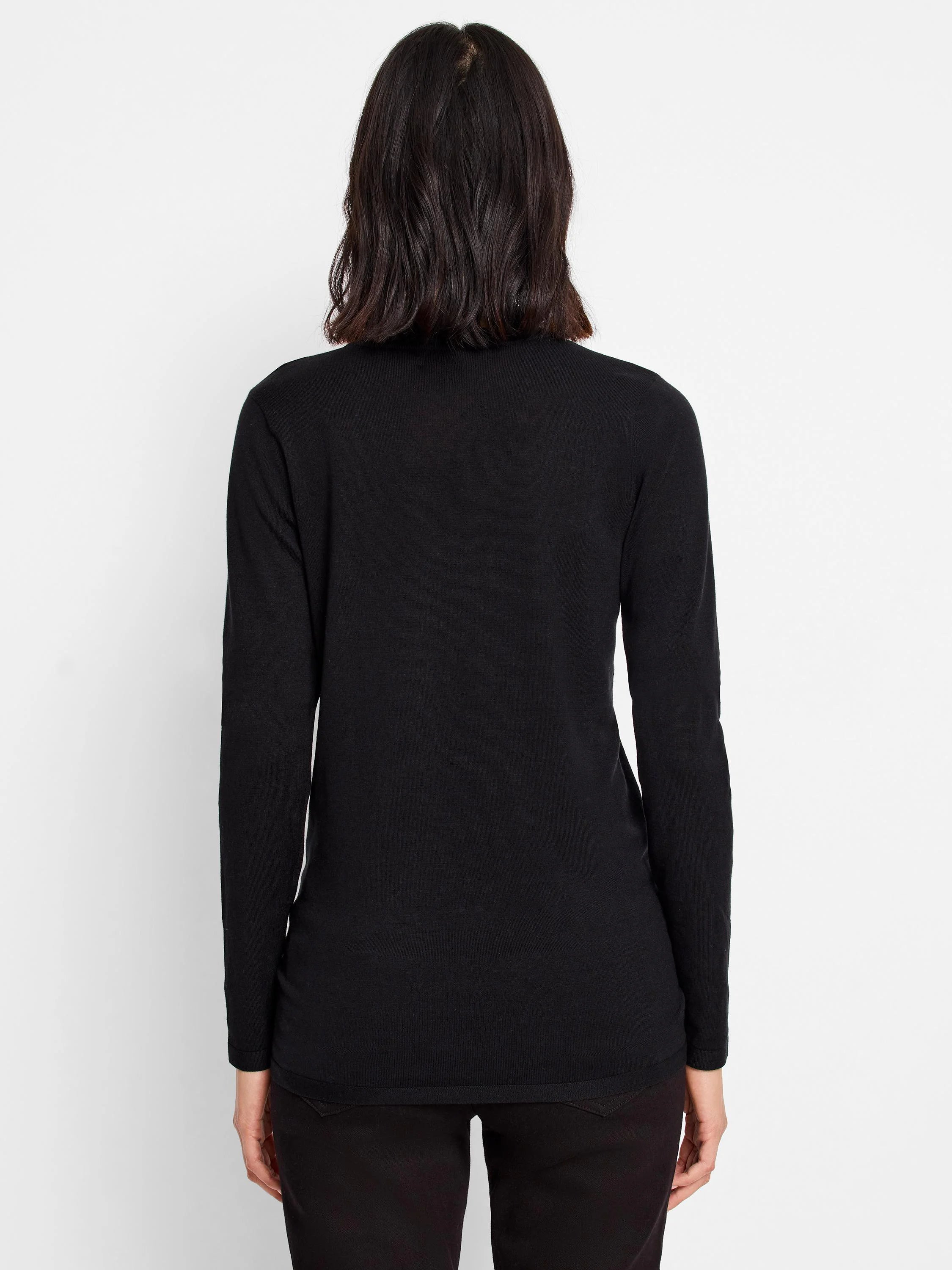 Black V-neck sweater tee, long sleeves. Rear view.