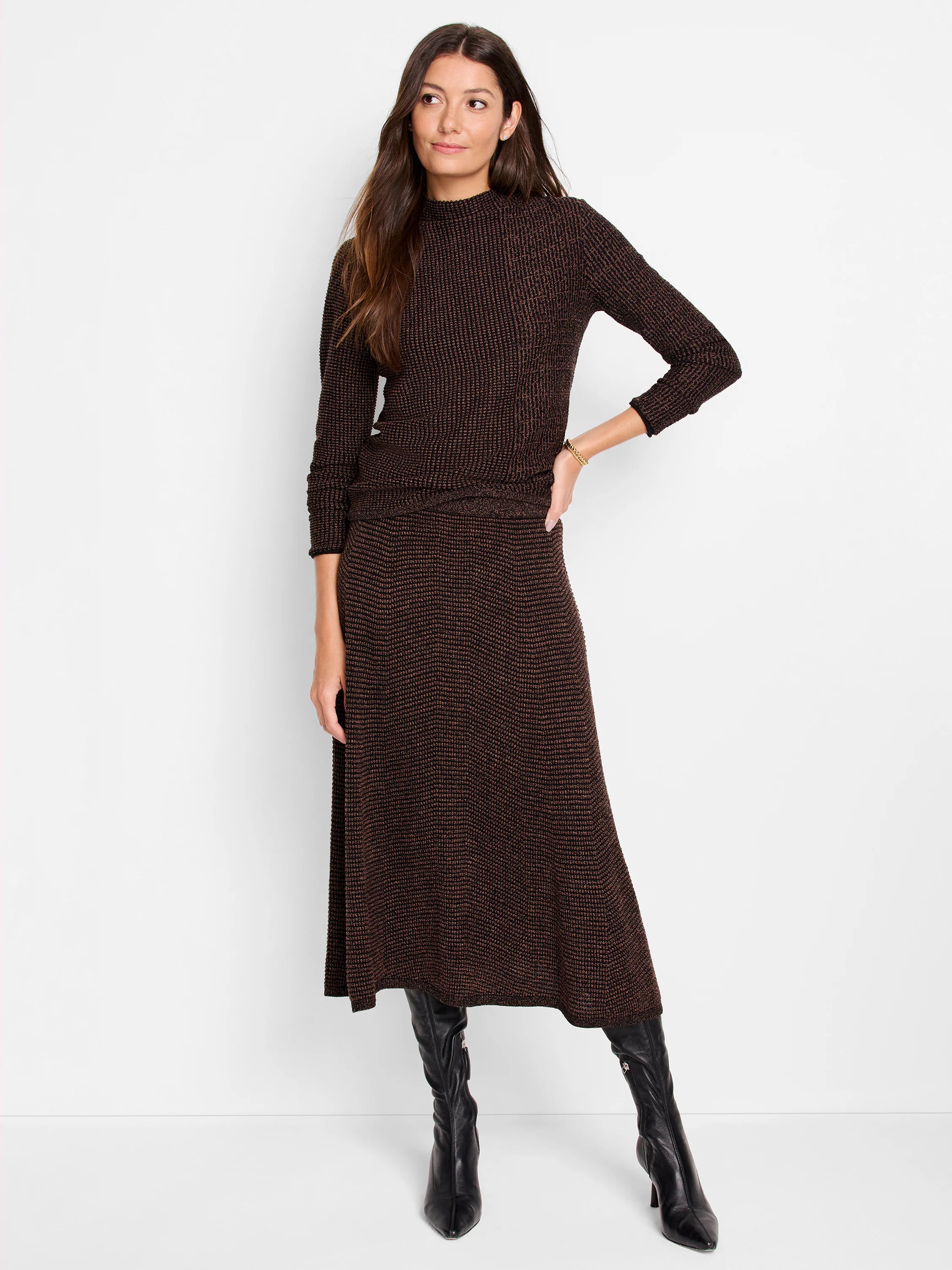 Dark brown midi skirt with subtle metallic flecks, knit texture. A-line silhouette.