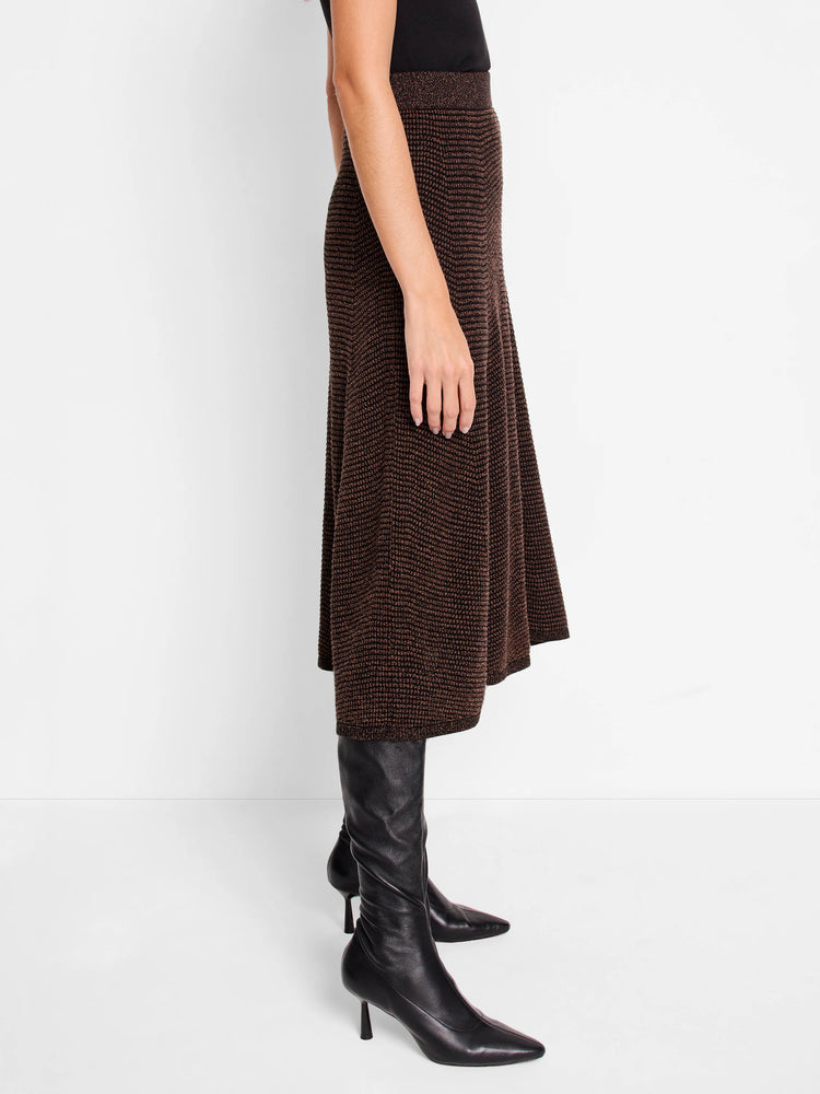 Dark brown pixel knit midi skirt, A-line shape. Knit texture with lighter brown flecks.