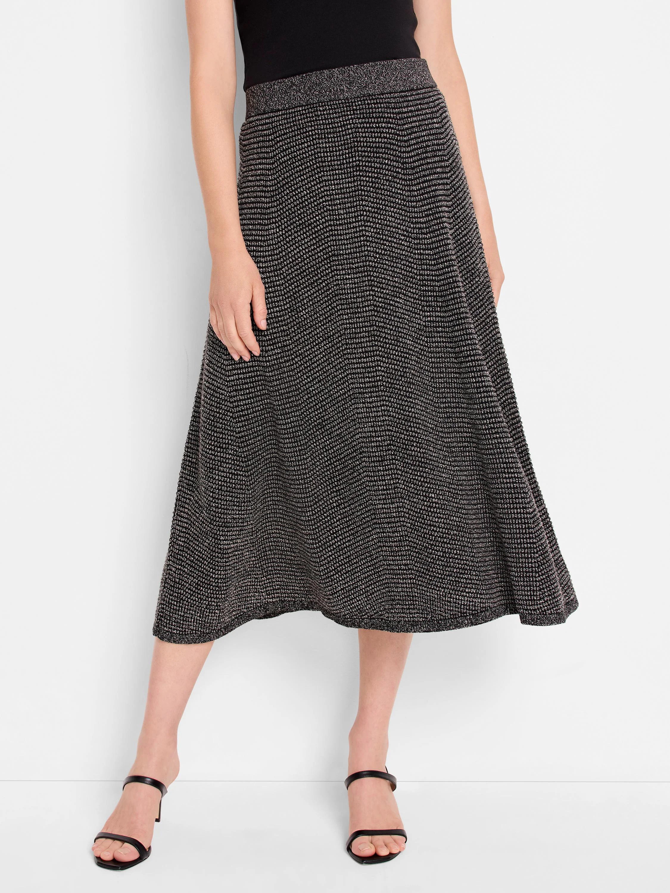 Black and silver pixel knit midi skirt with an A-line shape.
